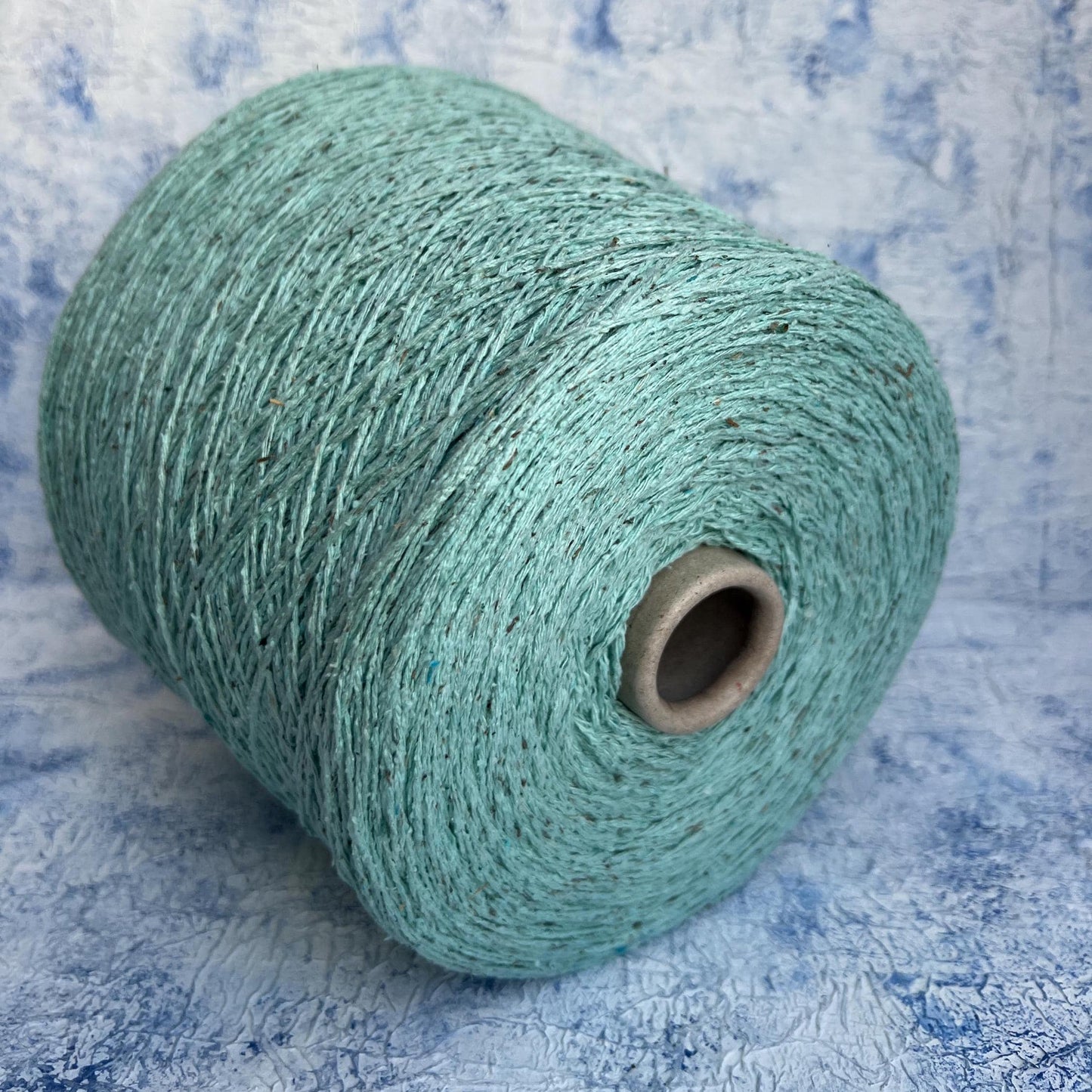 Silk Bourette yarn 100%, Nm 4000, Color Light Cyan. Per 100 gr