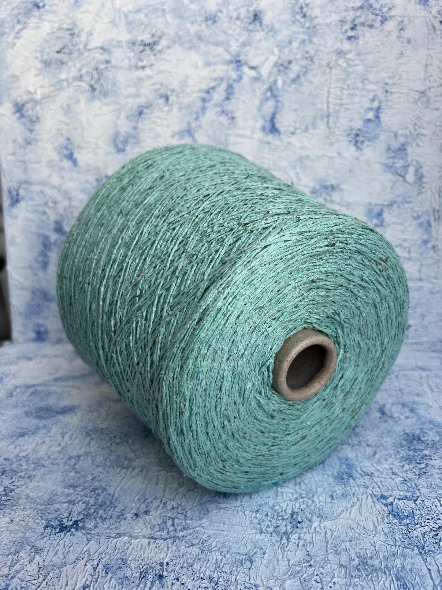 Silk Bourette yarn 100%, Nm 4000, Color Light Cyan. Per 100 gr