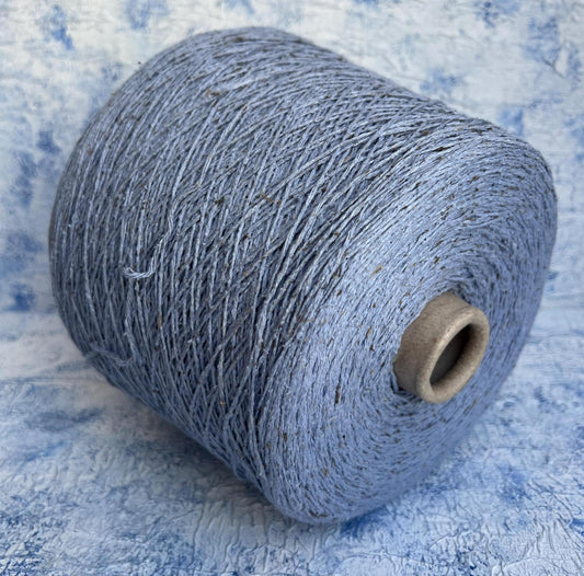 Silk Bourette yarn on cone 100%,Nm 4000, Color Light Blue.Per 100 gr