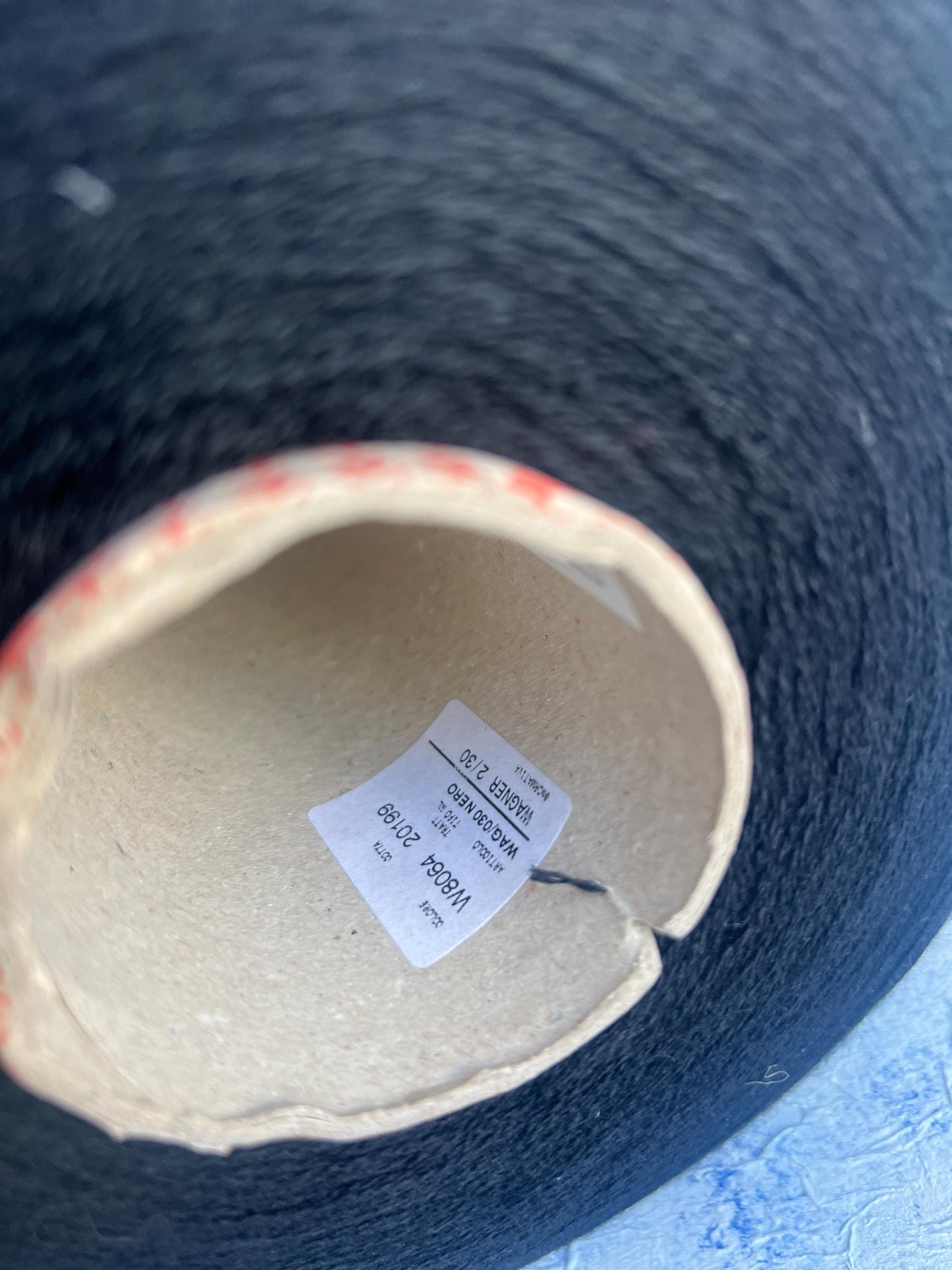 100% Merino fine yarn on cone. Nm 2/30, Color Black.Per 100 gr
