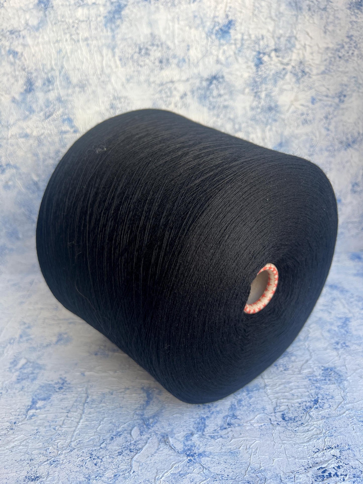 100% Merino fine yarn on cone. Nm 2/30, Color Black.Per 100 gr