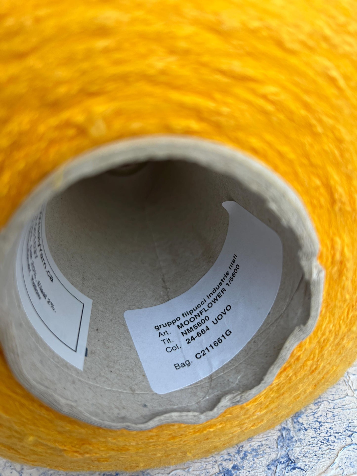 Cotton yarn 48%, PA 30%, Silk yarn 20%, Elast 2%.Moonflower, Orange.Per 100 gr