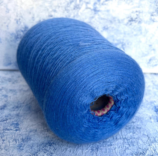 100% Merino wool fine yarn on cone. Nm 2/30, Color Blue. Per 100 gr