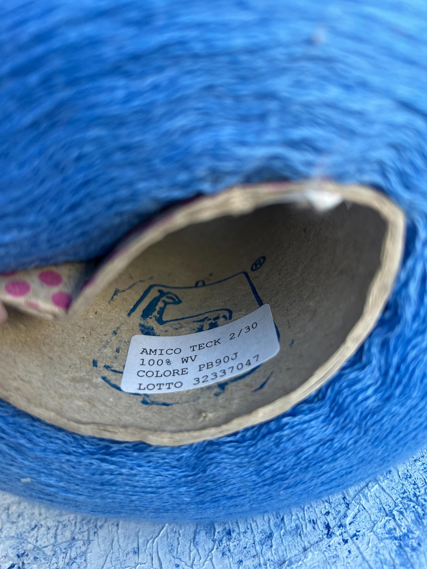 100% Merino wool fine yarn on cone. Nm 2/30, Color Blue. Per 100 gr