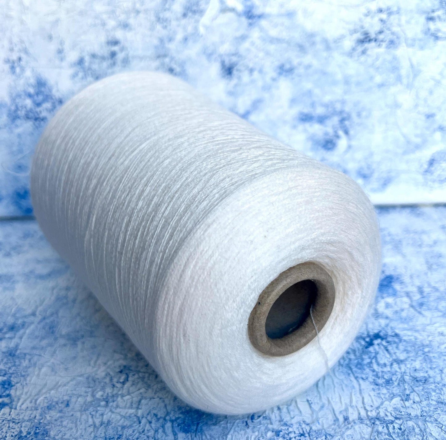 Merino wool yarn 100%, Loro Piana Wish yarn on cone, White. Per 100 gr