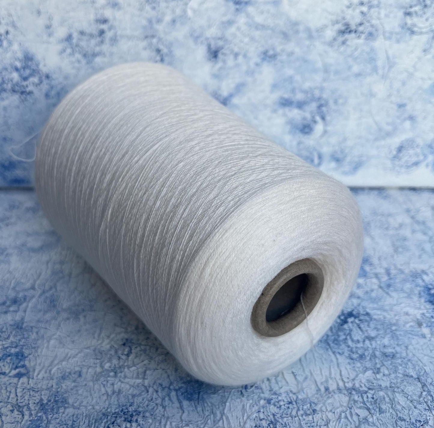 Merino wool yarn 100%, Loro Piana Wish yarn on cone, White. Per 100 gr