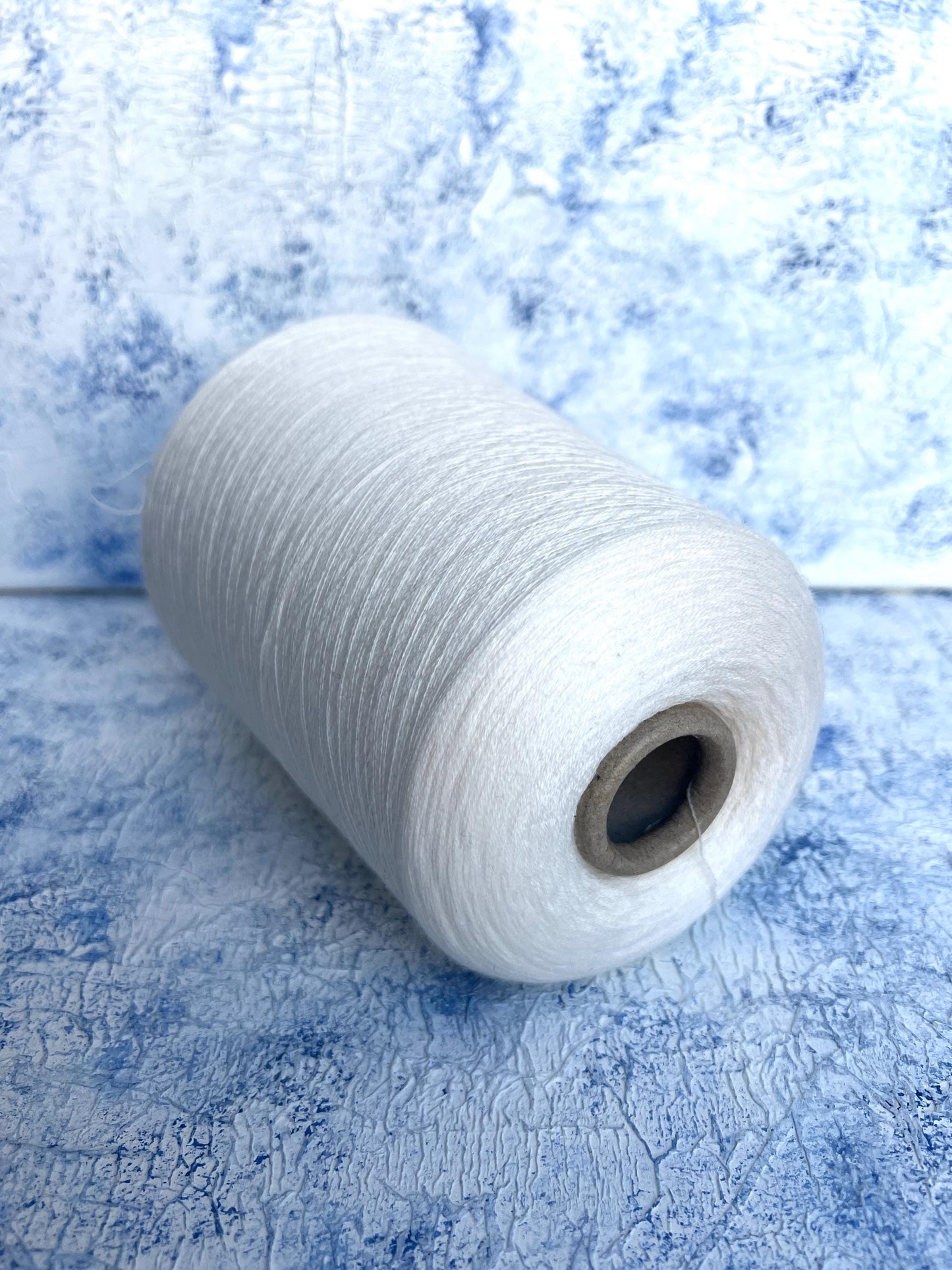 Merino wool yarn 100%, Loro Piana Wish yarn on cone, White. Per 100 gr