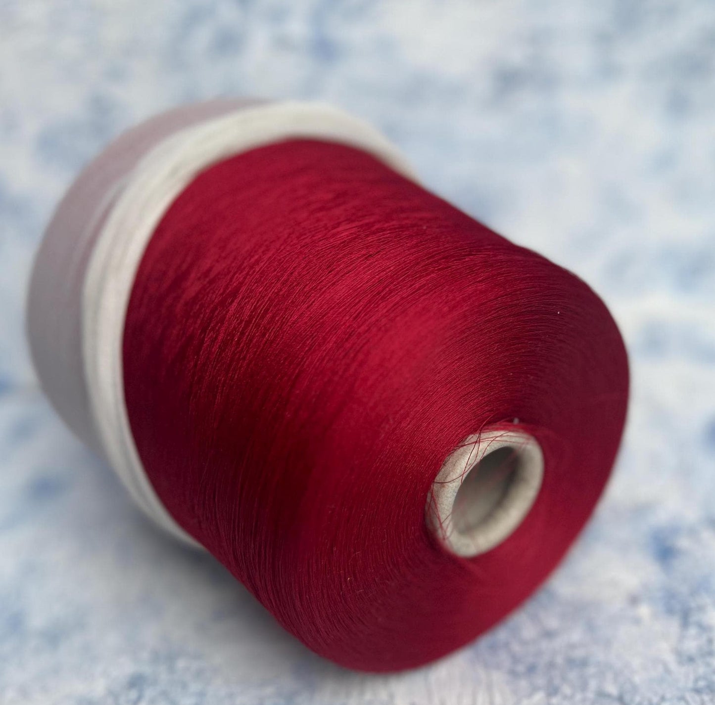 Silk yarn on cone 100%,Pecci Filati yarn, Color Red. Per 100 gr