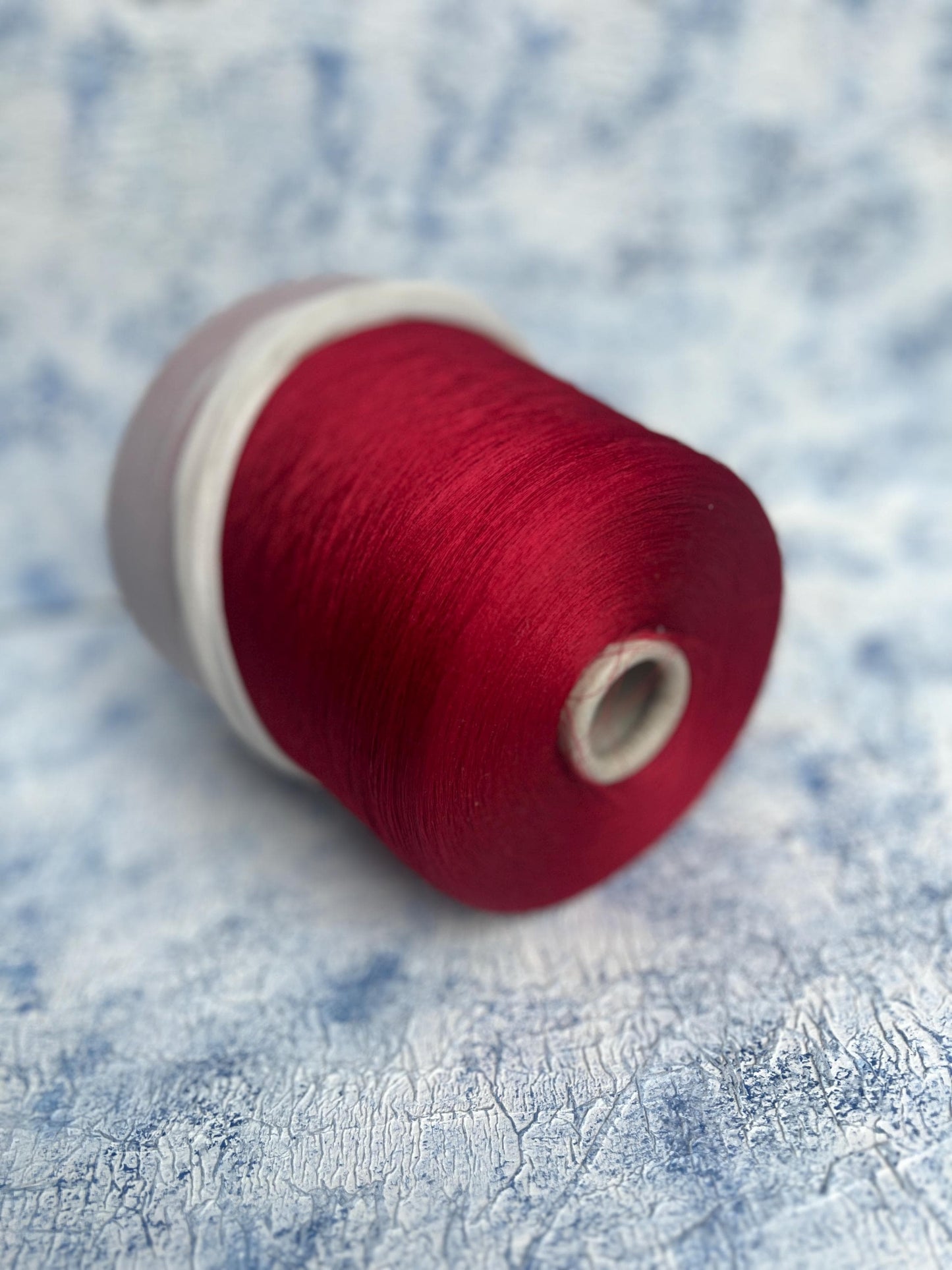 Silk yarn on cone 100%,Pecci Filati yarn, Color Red. Per 100 gr