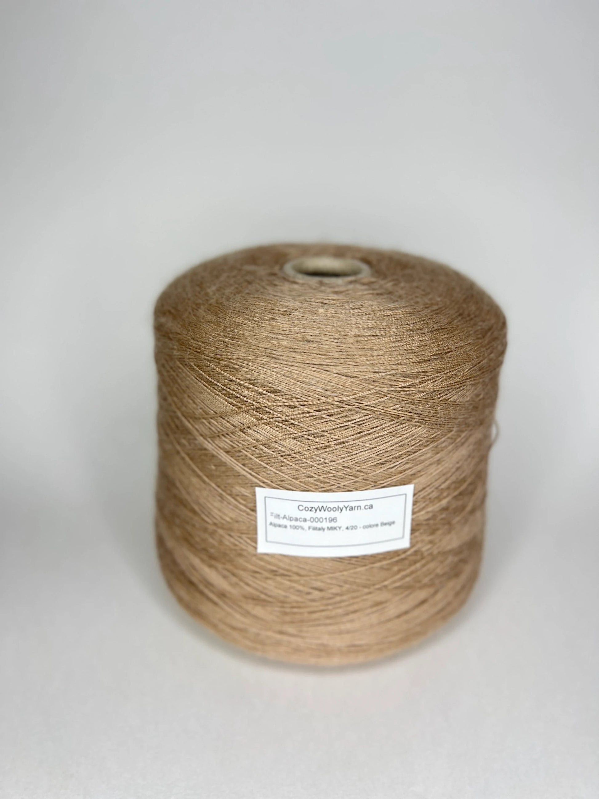 Alpaca yarn on cone, 100% Alpaca yarn, Alpaca yarn by Filitaly MIKI. Alpaca yarn made in Italy.Yarn on Cone.
Fiber: 100% Alpaca Yarn.  Yarn Colour: Beige. Yarn for knitting machine. Alpaca yarn.