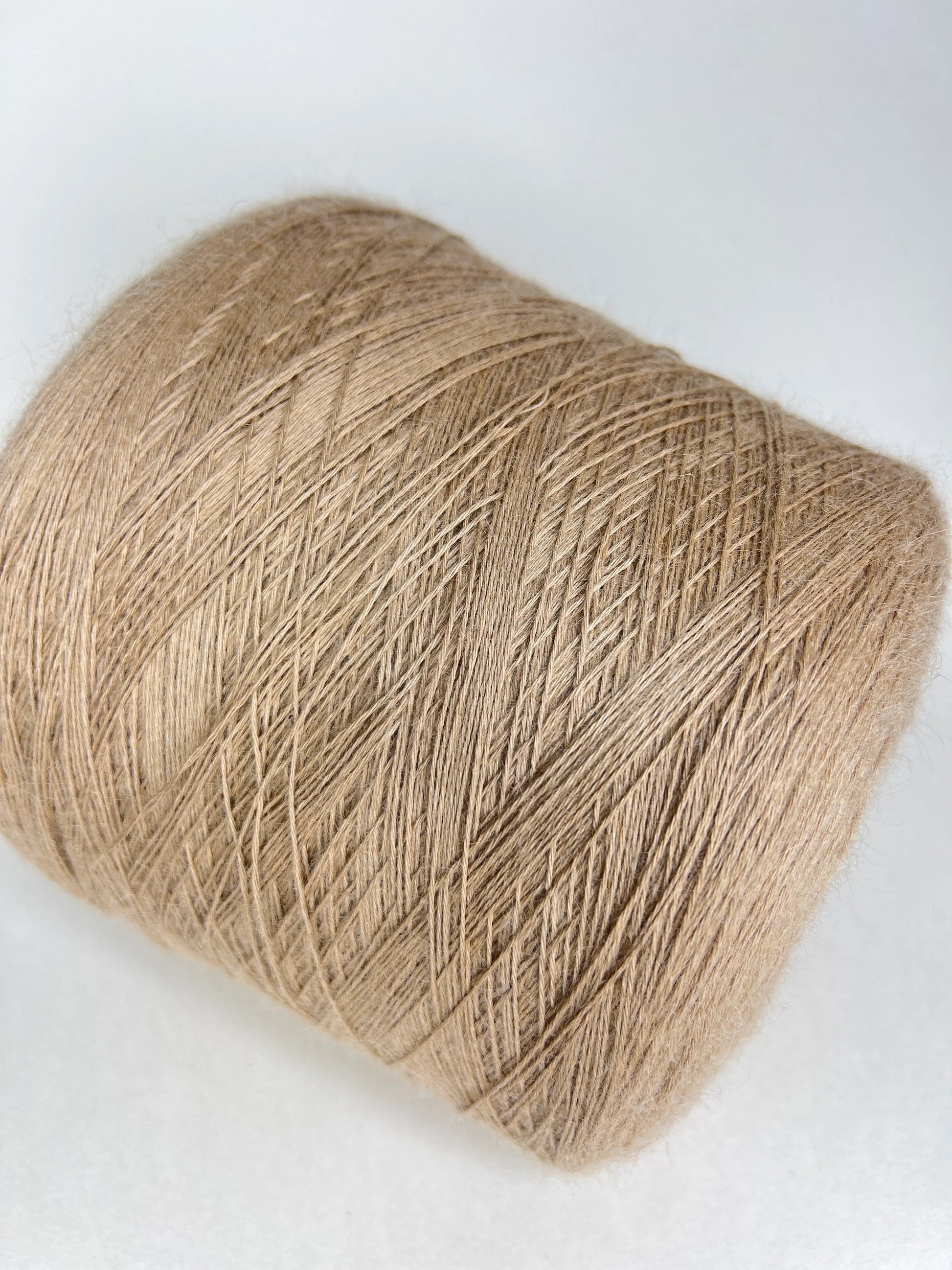Alpaca yarn on cone, 100% Alpaca yarn, Alpaca yarn by Filitaly MIKI. Alpaca yarn made in Italy.Yarn on Cone.
Fiber: 100% Alpaca Yarn.  Yarn Colour: Beige. Yarn for knitting machine. Alpaca yarn.