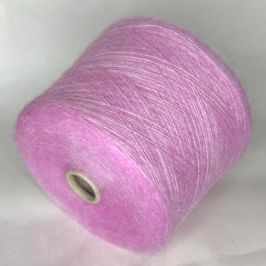 Super Kid Mohair Yarn & Poliamide Yarn. Yarn on Cone. Art: GLOPIA. Fibre: 70% Super kid mohair Yarn & 30% Poliamide Yarn. Color: Rosa. This is a luxurious yarn, very soft and fluffy yarn with a wonderful composition yarn of 70% Super Kid mohair yarn and 30% Poliamide yarn.