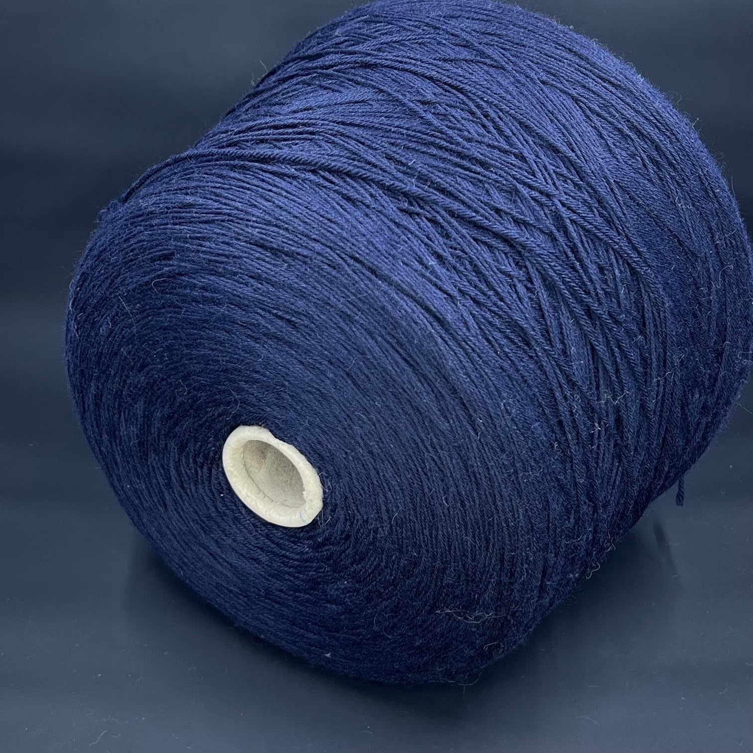 Merino wool yarn. 100% Sessia TWIN - Italian fine yarn at available at our Yarn Store in Canada, Machine Knitting. Color yarn: Navy (dark blue). This is a very soft merino wool yarn.