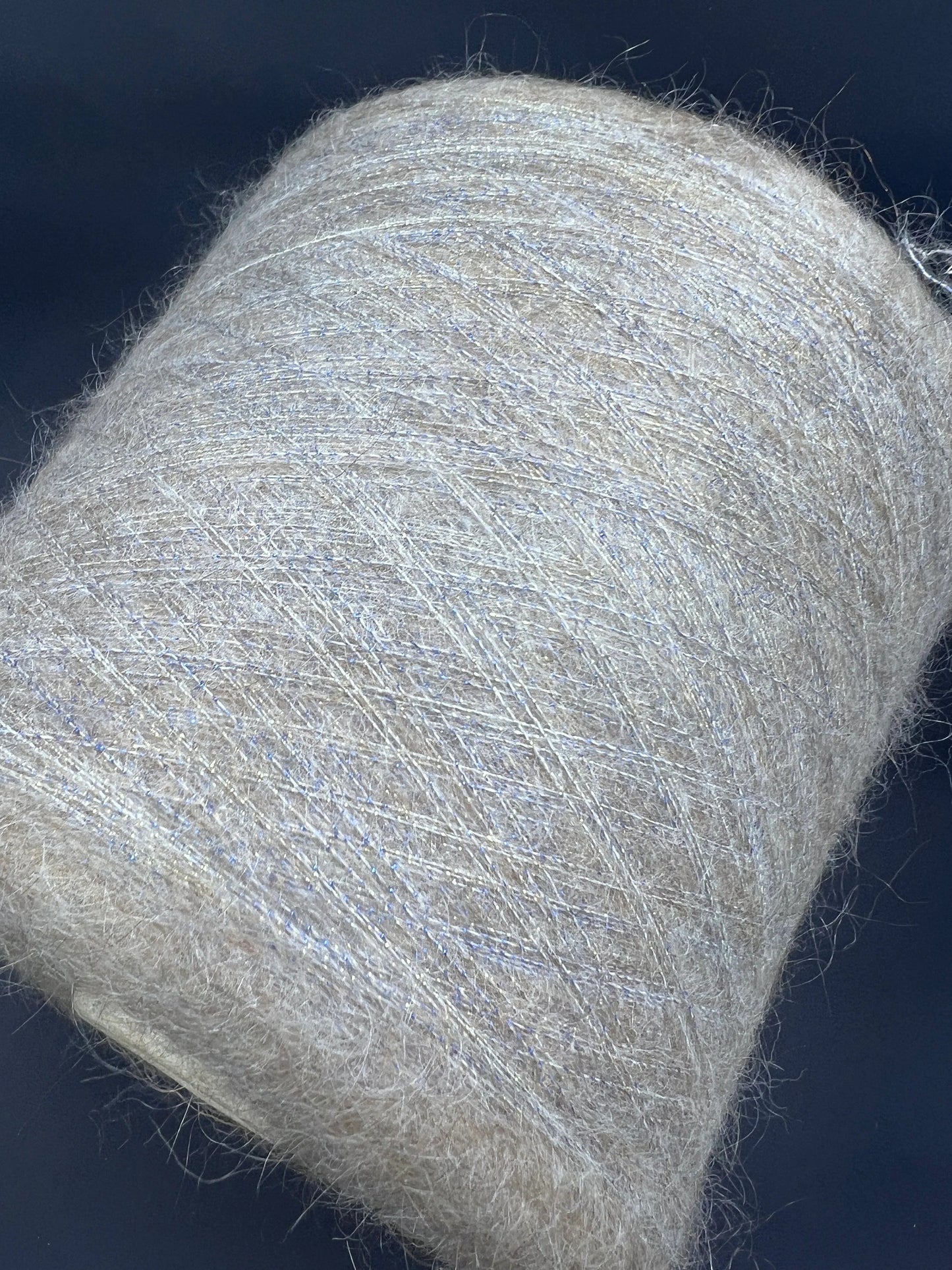 Filati Power Art: Prestige. Lux Fibre: 60% babykid mohair yarn, 16% extrafine merino wool yarn, 26% Nylon yarn, 8% Metallized yarn available at our Yarn Store in Canada. Country: Italy. Color: HAY GOLD. Yarn on cone.