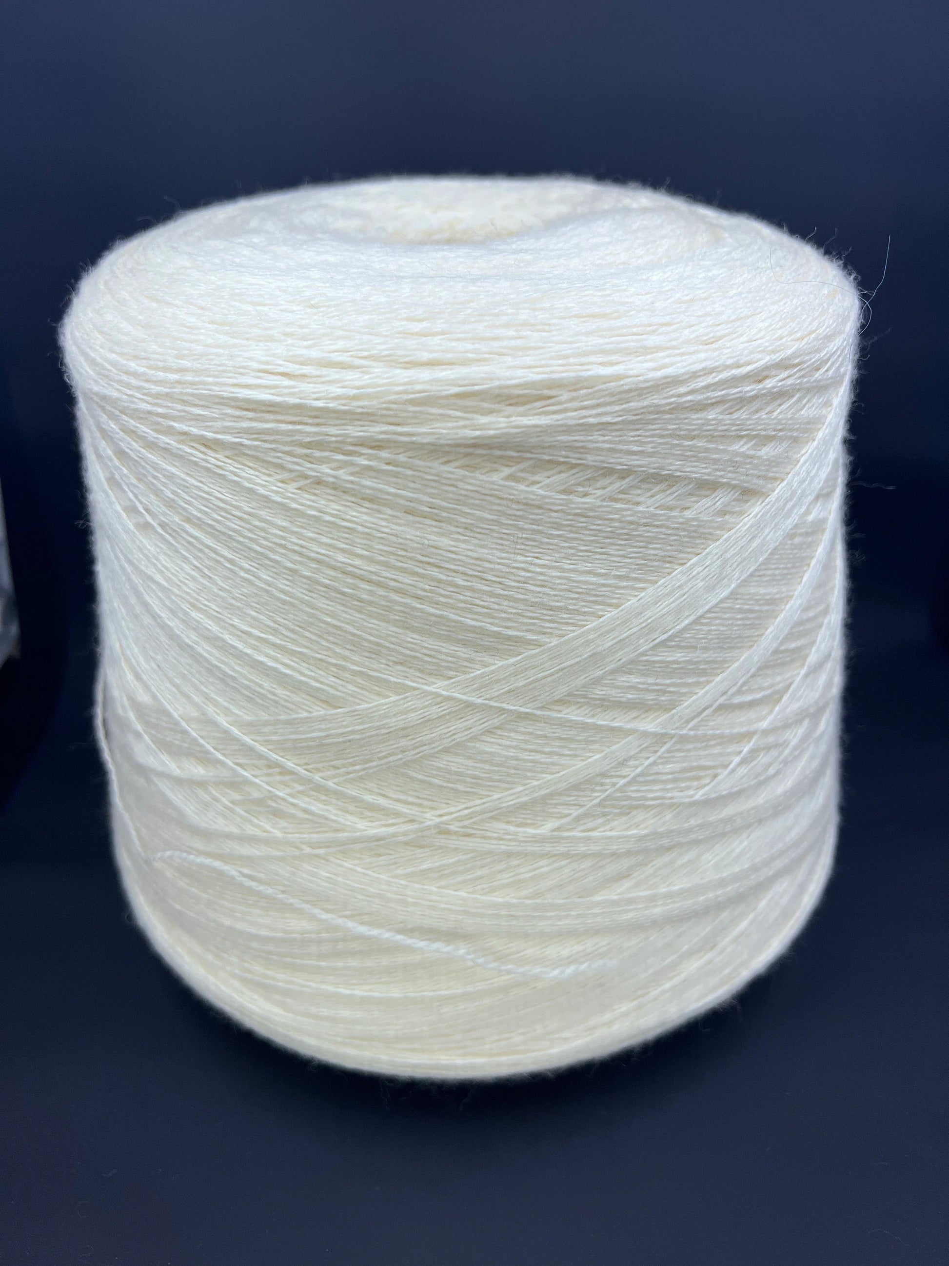 100% Merino wool yarn. Sessia TWIN - Italian fine yarn. Color yarn: White. This is a very soft merino yarn can be purchased at our yarn store in Canada.