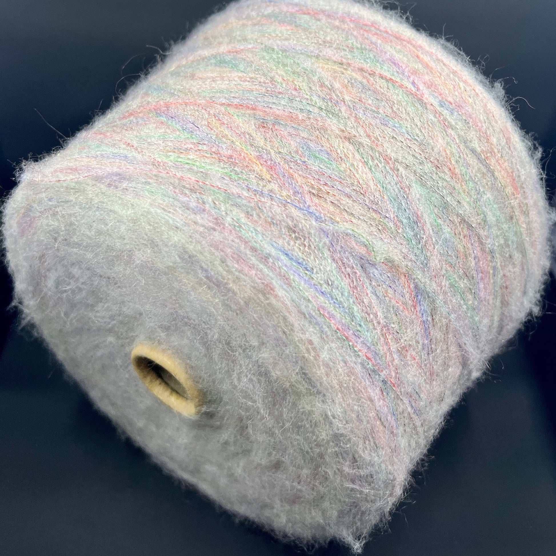 Reference: PROFILO S.N.C. Art: TUI. Fibre: 30% Super kid mohair yarn, 10% Merino wool yarn, 30% Nylon yarn, 30% Acrilico yarn, this yarn can be purchased at our yarn store in Canada. Footage: 900 m per 100 g. Yarn from country: Italy. Yarn Color: ARCOBALENO MEL.  Can be used for knitting (both machine and hand).