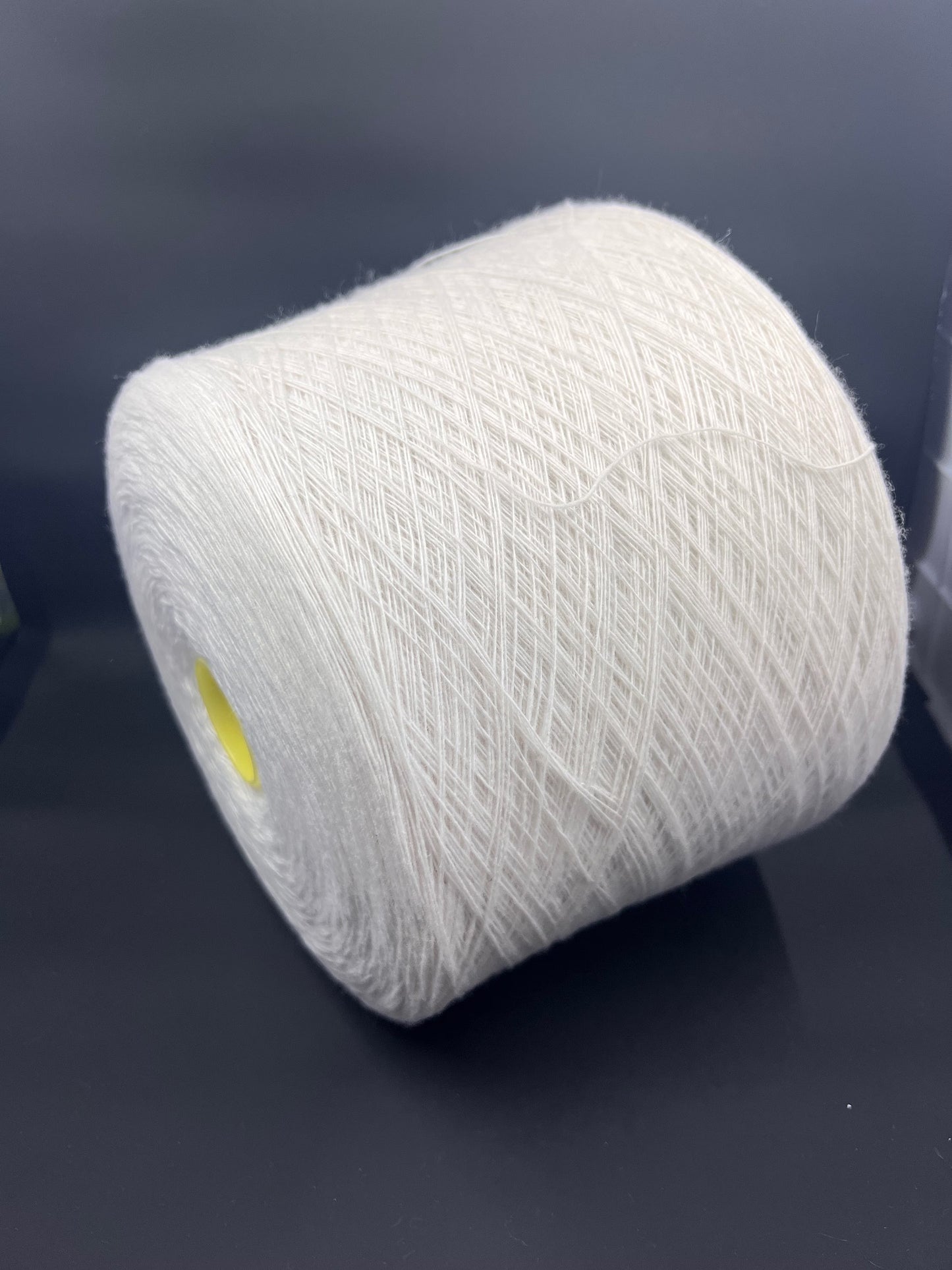 Merino Wool Yarn 100%, Supergeelong, ZEGNA BARUFFA , Color White, Yarn on Cone. Italian Lace Yarn. Hand and Machine Knitting. Fiber: 100% Merino Wool Yarn. Supergeelong Nm 1/15. Reference: Zegna Baruffa LANE BORGOSESSIA Nm1/15. Italian Lace Yarn, Machine knitting, Hand Knitting.