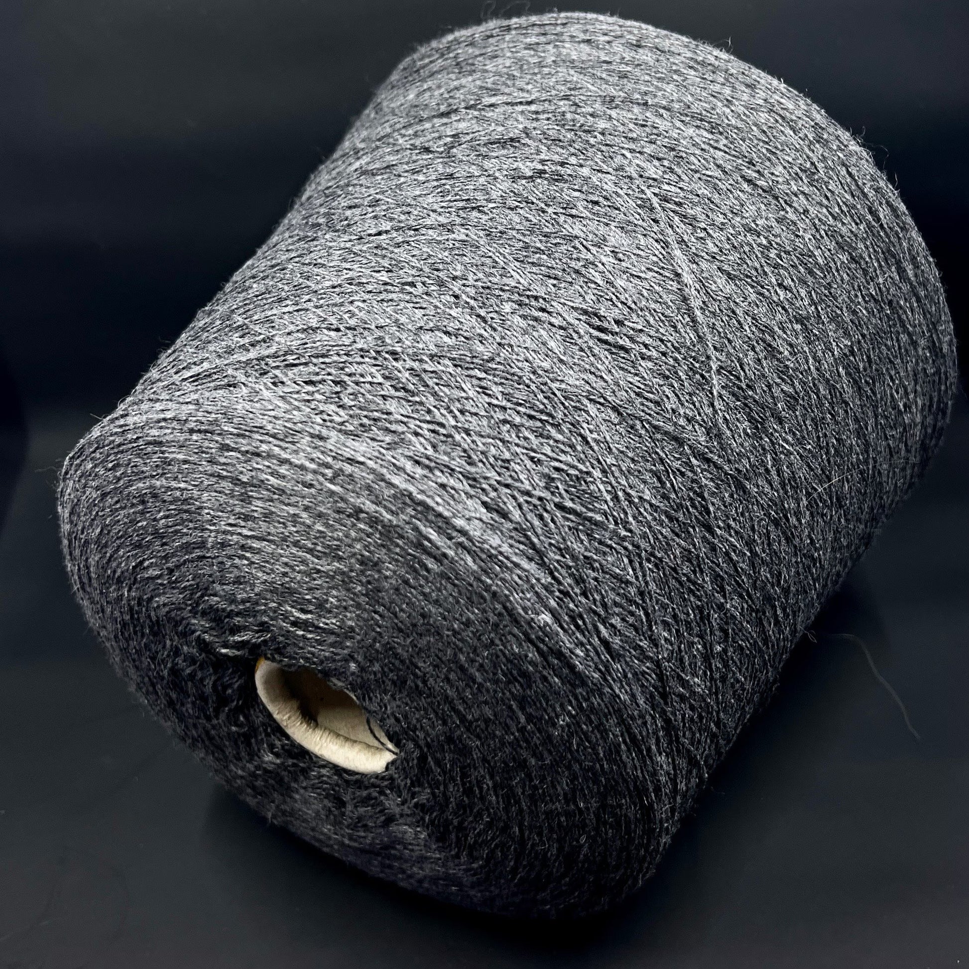Cashmere Yarn by Cariaggi. Cashmere Yarn for Hand & Machine Knitting.  Fiber: 100% Cashmere Yarn. Yarn Colour: Carbon Gray  Reference: Cariaggi, Nm 2/28 This is a very soft pure Cashmere yarn by Cariaggi.