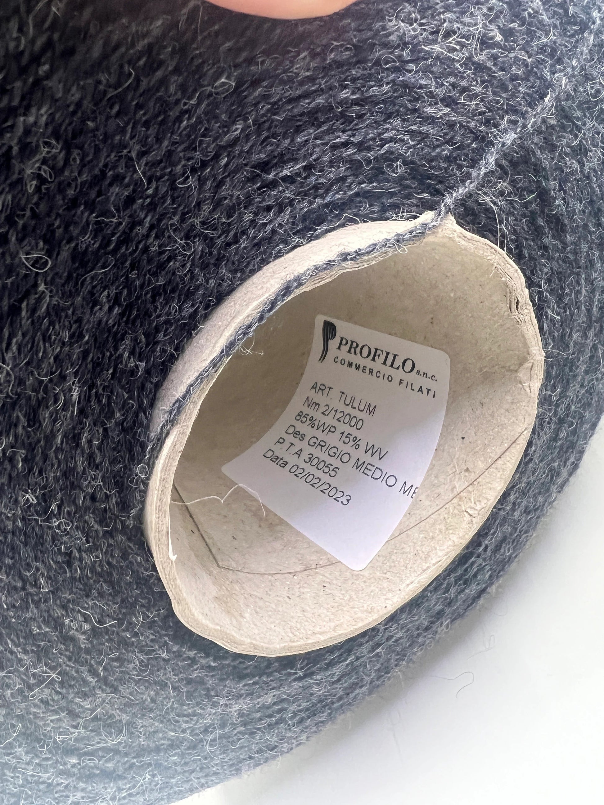 Fibre: 85% Alpaca Yarn, 15% merino wool yarn. Yarn on Cone for machine or hand knitting. Reference: Profillo TULUM Nm 2/12000 Weight: your choice Footage: 600m per 100g/ 656 yard per 3.35oz. Country: Italy. Color: Grigio mel. Can be used for knitting (both machine and hand).