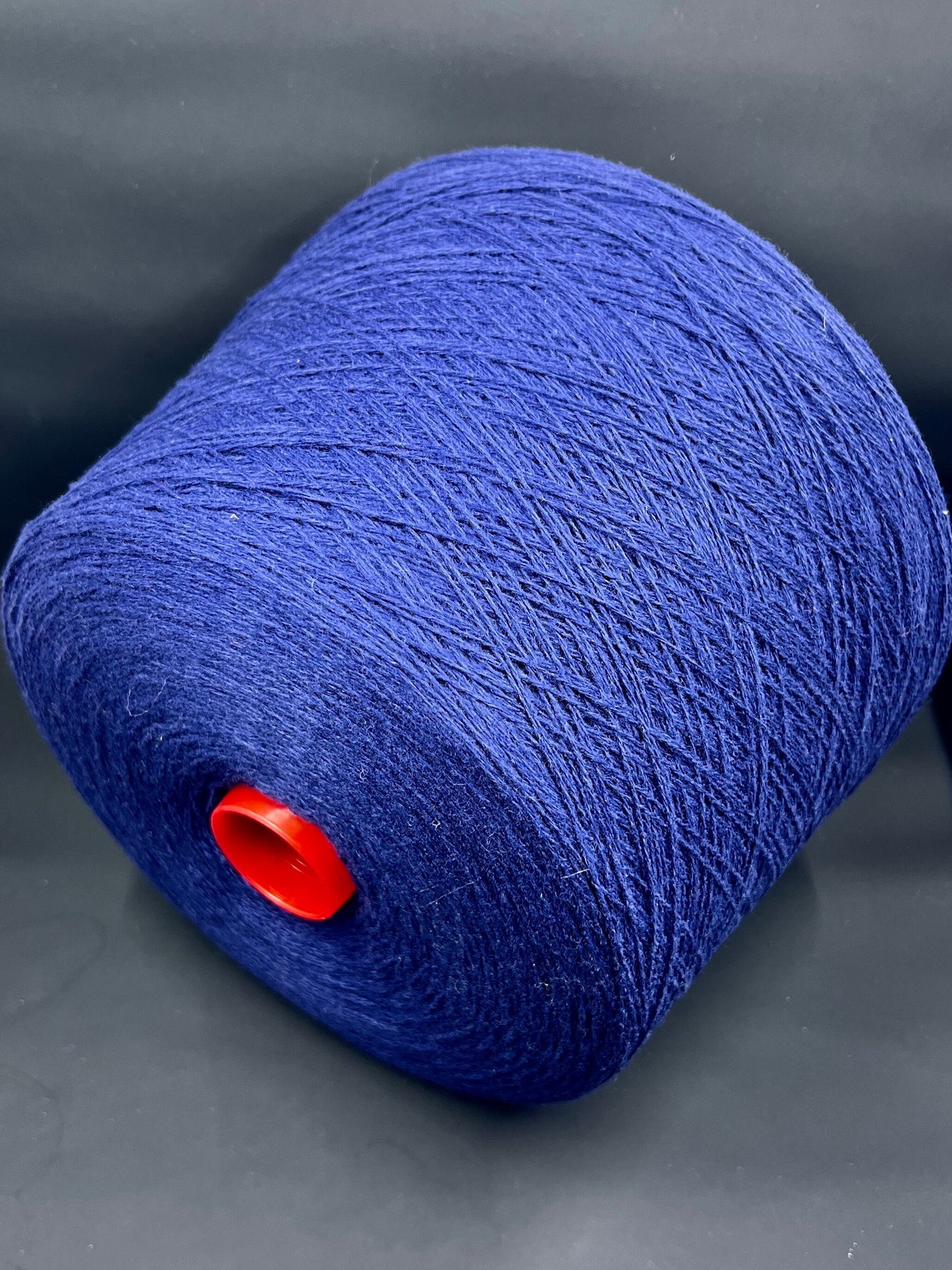 Merino Wool Yarn 100%, Kent ZEGNA BARUFFA , Color Dark Blue, Yarn on Cone. Italian Lace Yarn. Hand and Machine Knitting. Fiber: 100% Merino Wool Yarn. Supergeelong Nm 2/18. Reference: Zegna Baruffa LANE BORGOSESSIA. Italian Lace Yarn, Machine knitting, Hand Knitting.
