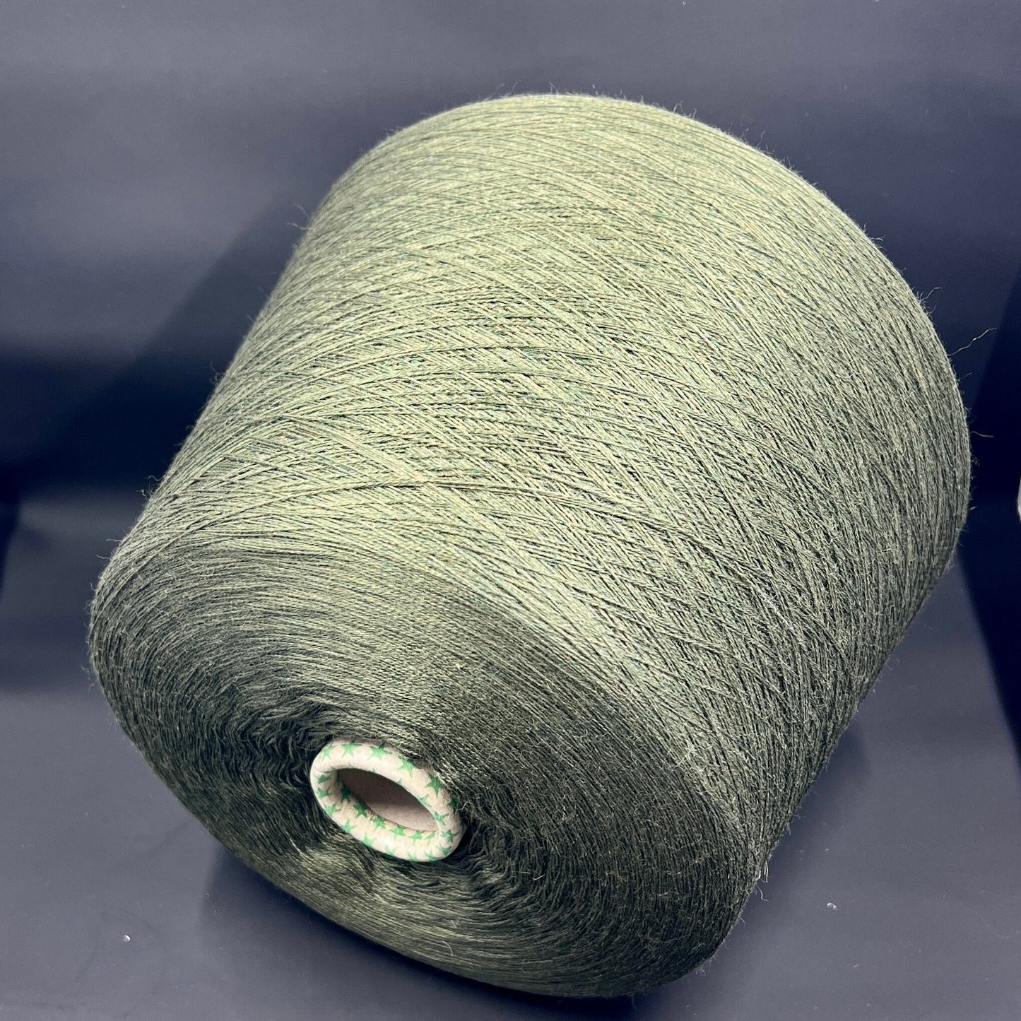Material: 100% Extra Fine Merino Wool Yarn by Tollegno, HARMONY 4. Fiber Composition: 100% Extrafine Merino Wool yarn. Color: Oliva. Experience the luxurious softness of our 100% Fine Merino Merino Wool Yarn. This yarn showcases the exceptional quality of Extra Fine Merino wool.