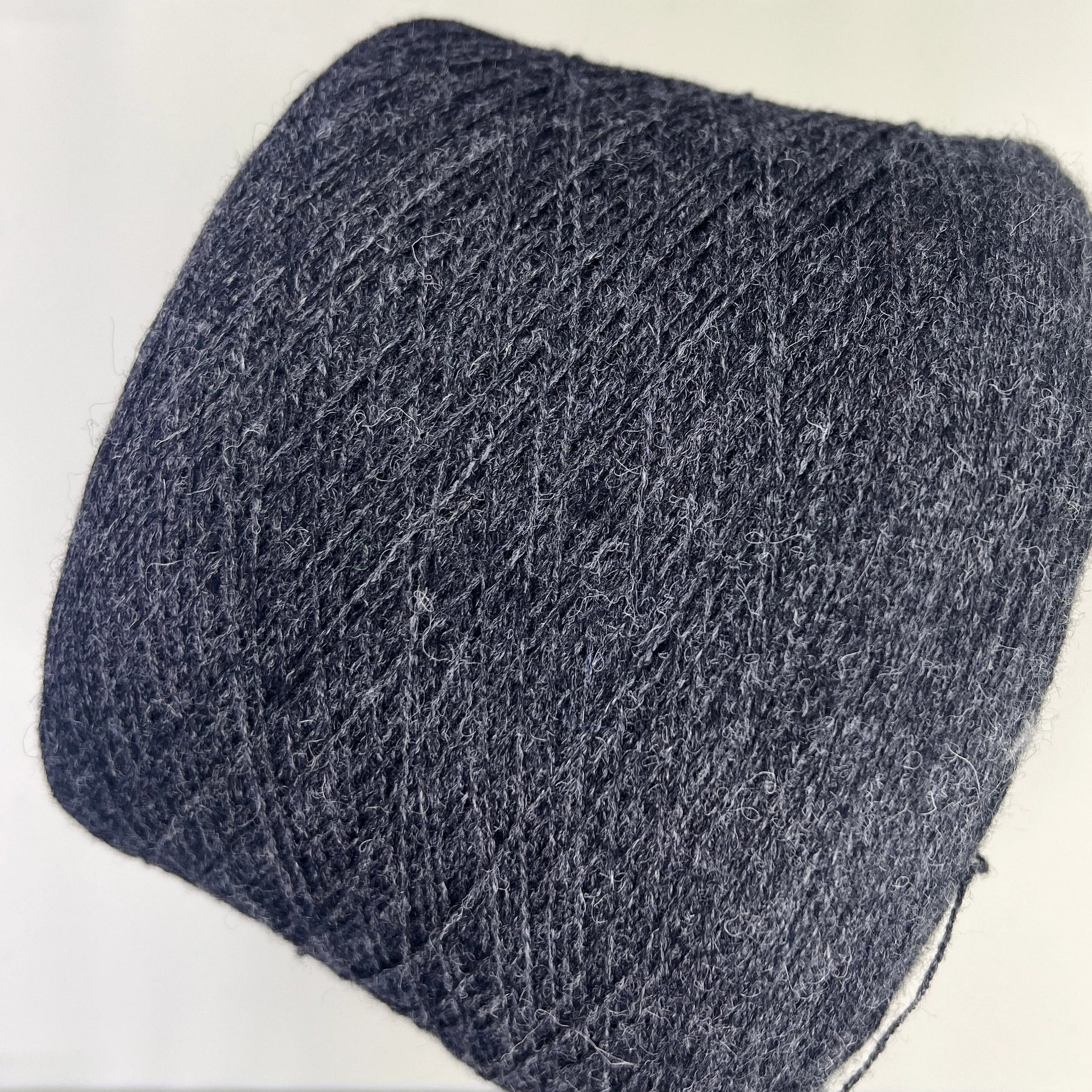 Fibre: 85% Alpaca Yarn, 15% merino wool yarn. Yarn on Cone for machine or hand knitting. Reference: Profillo TULUM Nm 2/12000 Weight: your choice Footage: 600m per 100g/ 656 yard per 3.35oz. Country: Italy. Color: Grigio mel. Can be used for knitting (both machine and hand).