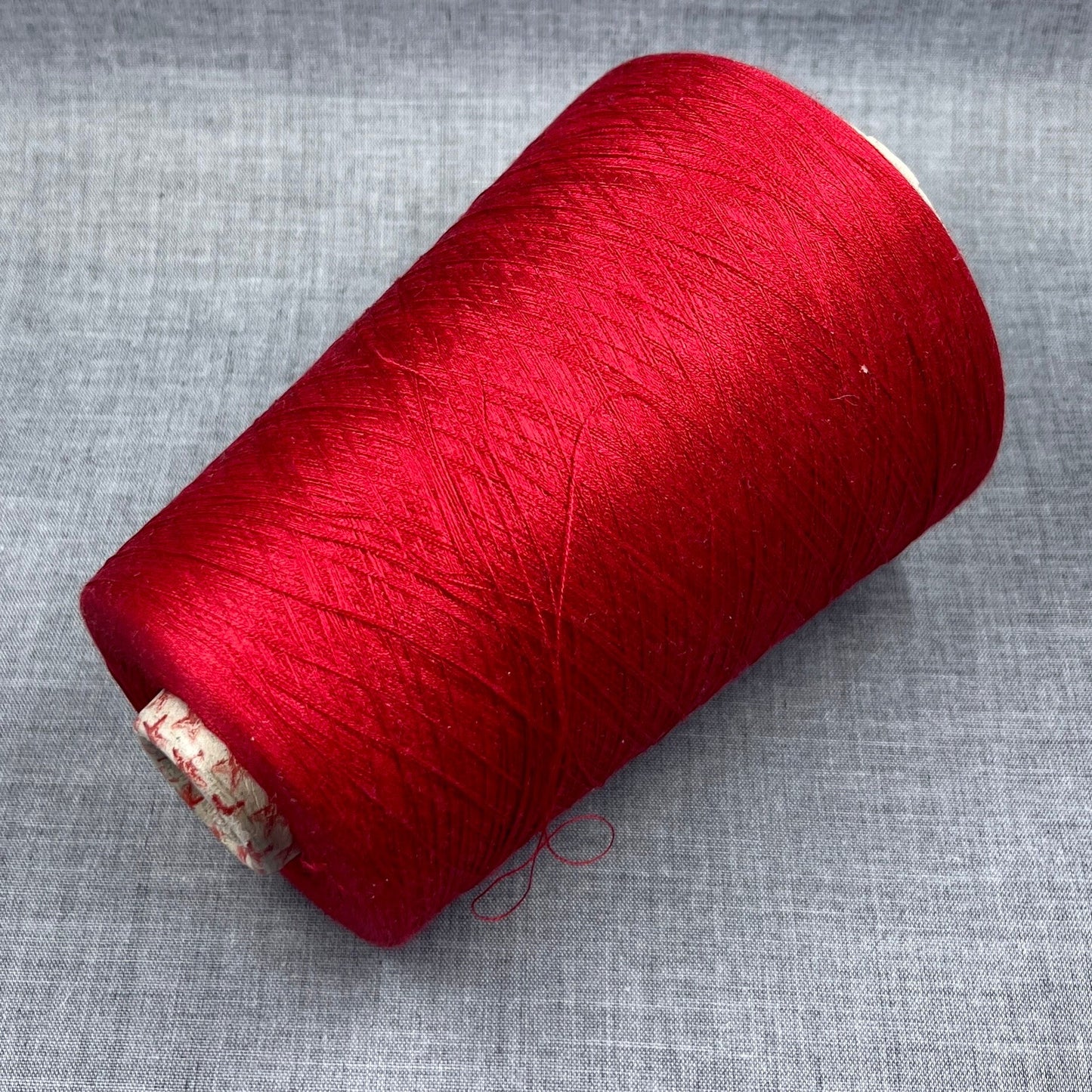 Silk Yarn 100%. Italian Silk Yarn for Hand & Machine Knitting. Reference: Botto Giuseppe, Schappe NM 2/120 Fibre: 100% Silk Yarn. Yarn Color: Red. The yarn will be perfect for weaving and knitting.