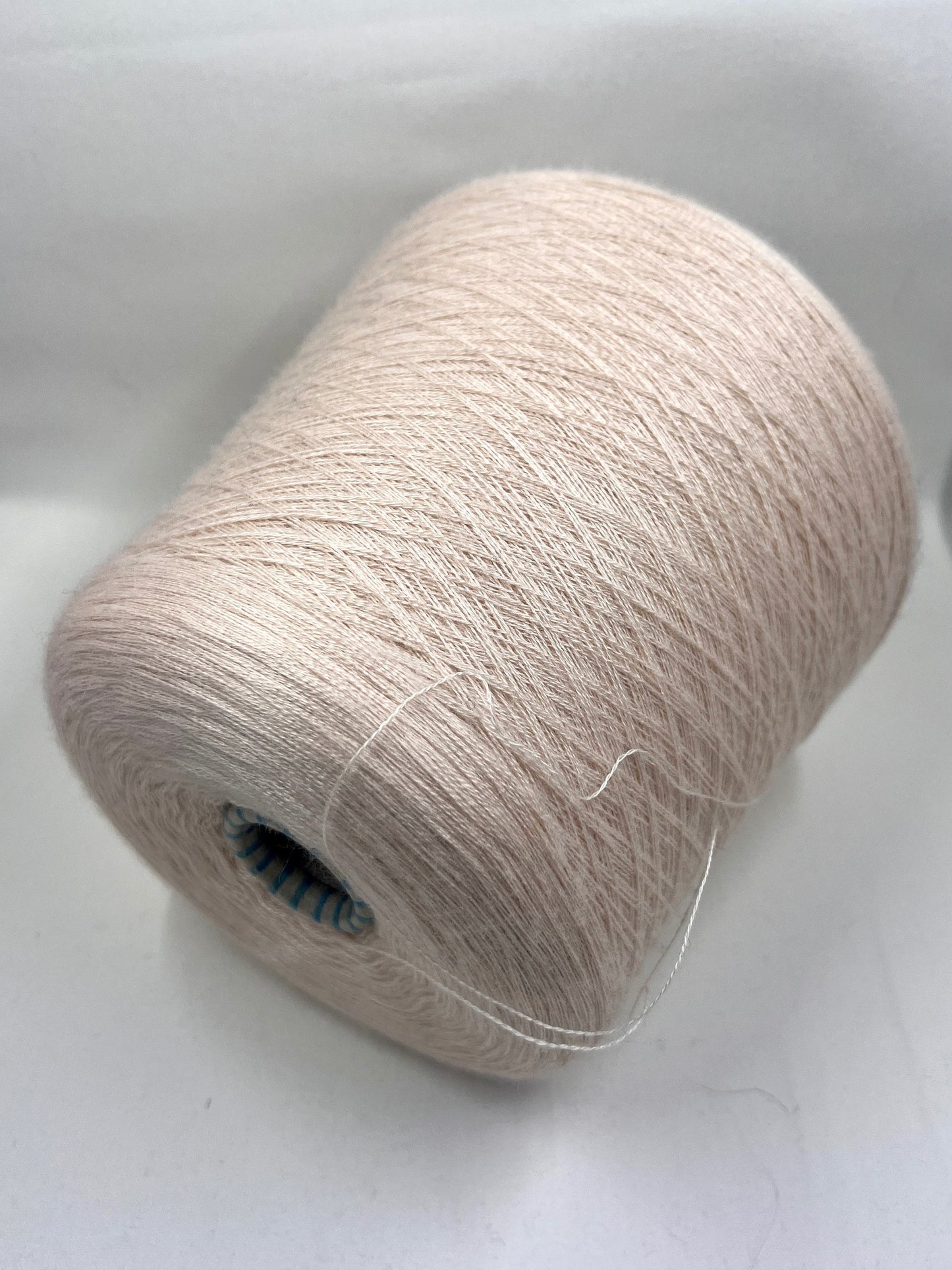 Cashmere blend Yarn by Botto Poala. Cashmere Yarn & Silk Yarn for Hand & Machine Knitting. Yarn on Cone. Fiber: 70% Cashmere Yarn & 30% Silk Yarn. Reference: Botto Poala, Nm 2/48 This is a very soft pure Cashmere blend yarn by Botto Poala.