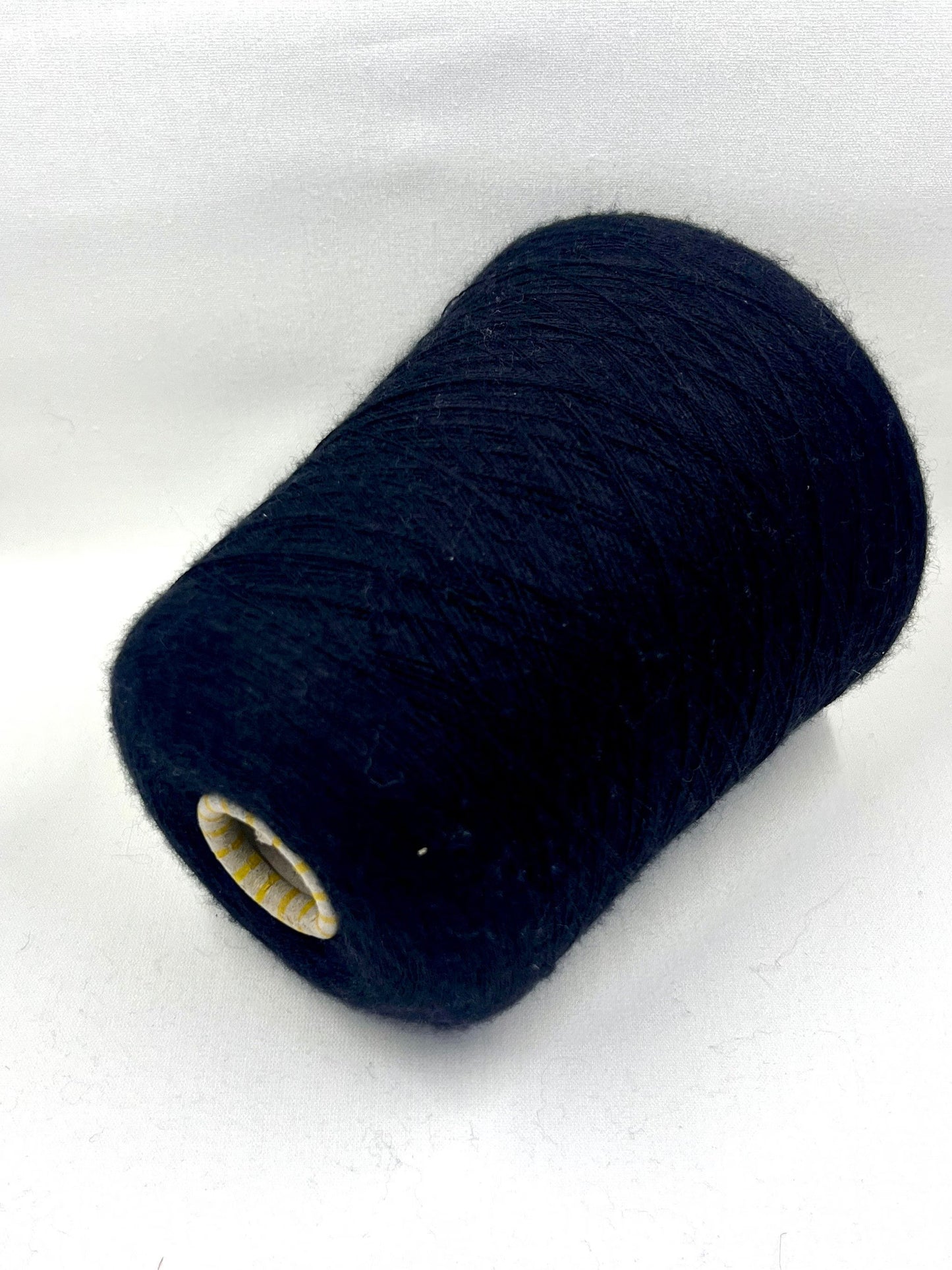 Cashmere blend Yarn by Botto Poala. Cashmere Yarn & Silk Yarn for Hand & Machine Knitting. Yarn on Cone. Fiber: 70% Cashmere Yarn & 30% Silk Yarn. Reference: Botto Poala, Nm 2/48 This is a very soft pure Cashmere blend yarn by Botto Poala.