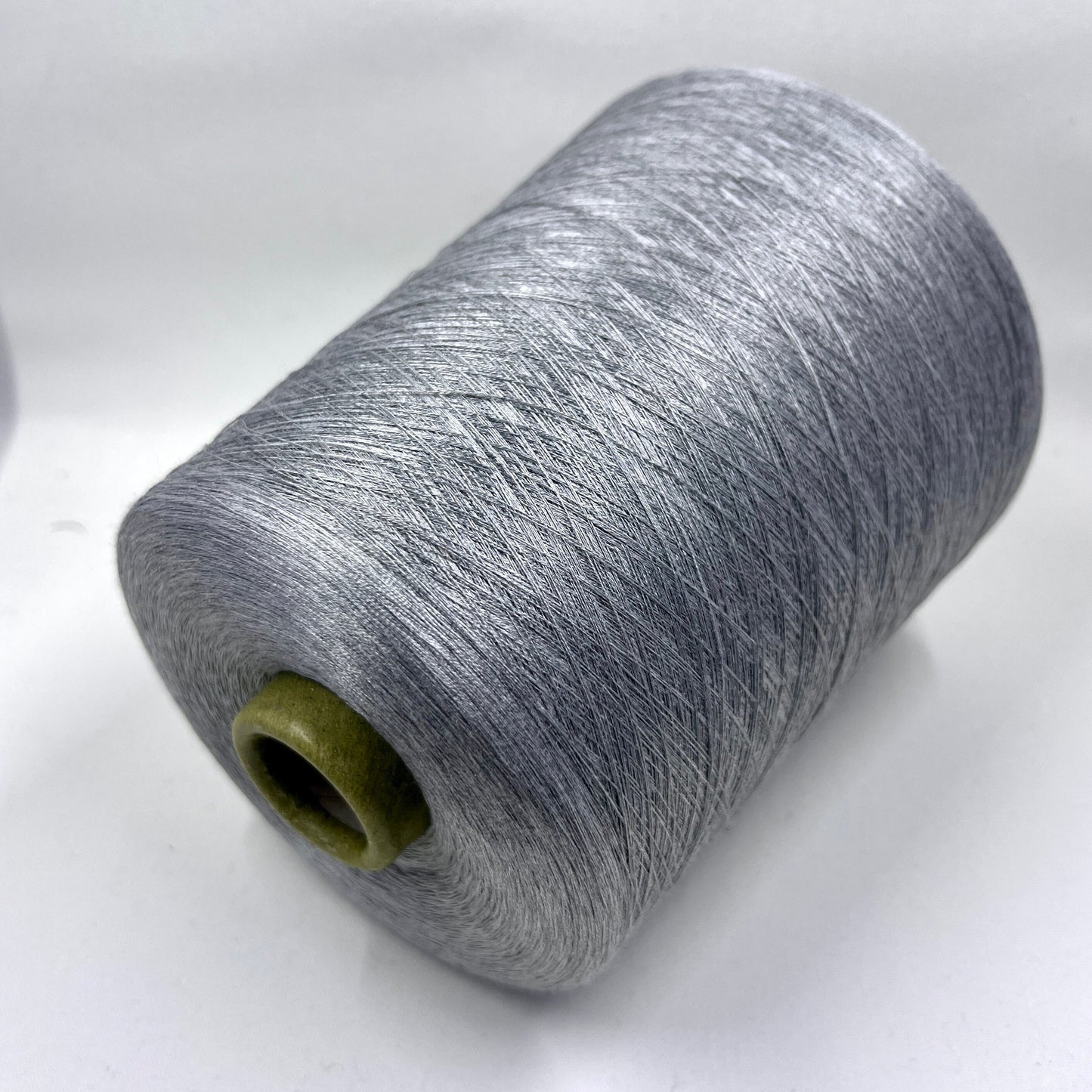 100% Silk Yarn. Italian Silk Yarn for Hand & Machine Knitting. Reference: Botto Giuseppe, Schappe NM 2/120 Fibre: 100% Silk Yarn. Yarn Color: Grigio (Steel Gray). The yarn will be perfect for weaving and knitting.