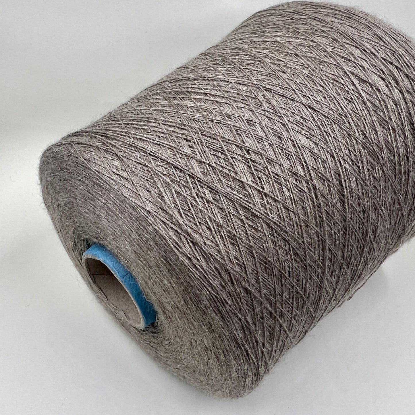 Royal Cashmere Yarn 70%, Silk Yarn 30%,Color Gray. Profilo SNC , Yarn on Cone. Italian Lace Yarn. Hand and Machine Knitting. Fiber: Royal Cashmere Yarn 70%, Silk Yarn 30%,Nm 1/80x5 Reference: Profilo SNC for Machine knitting and Hand Knitting.