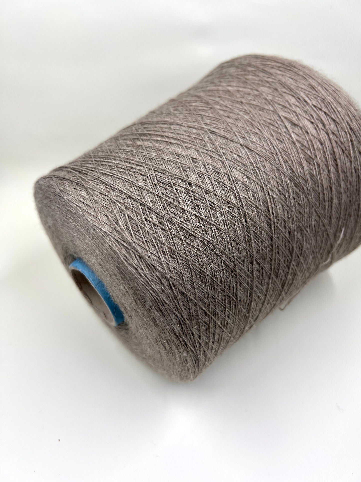 Royal Cashmere Yarn 70%, Silk Yarn 30%,Color Gray. Profilo SNC , Yarn on Cone. Italian Lace Yarn. Hand and Machine Knitting. Fiber: Royal Cashmere Yarn 70%, Silk Yarn 30%,Nm 1/80x5 Reference: Profilo SNC for Machine knitting and Hand Knitting.