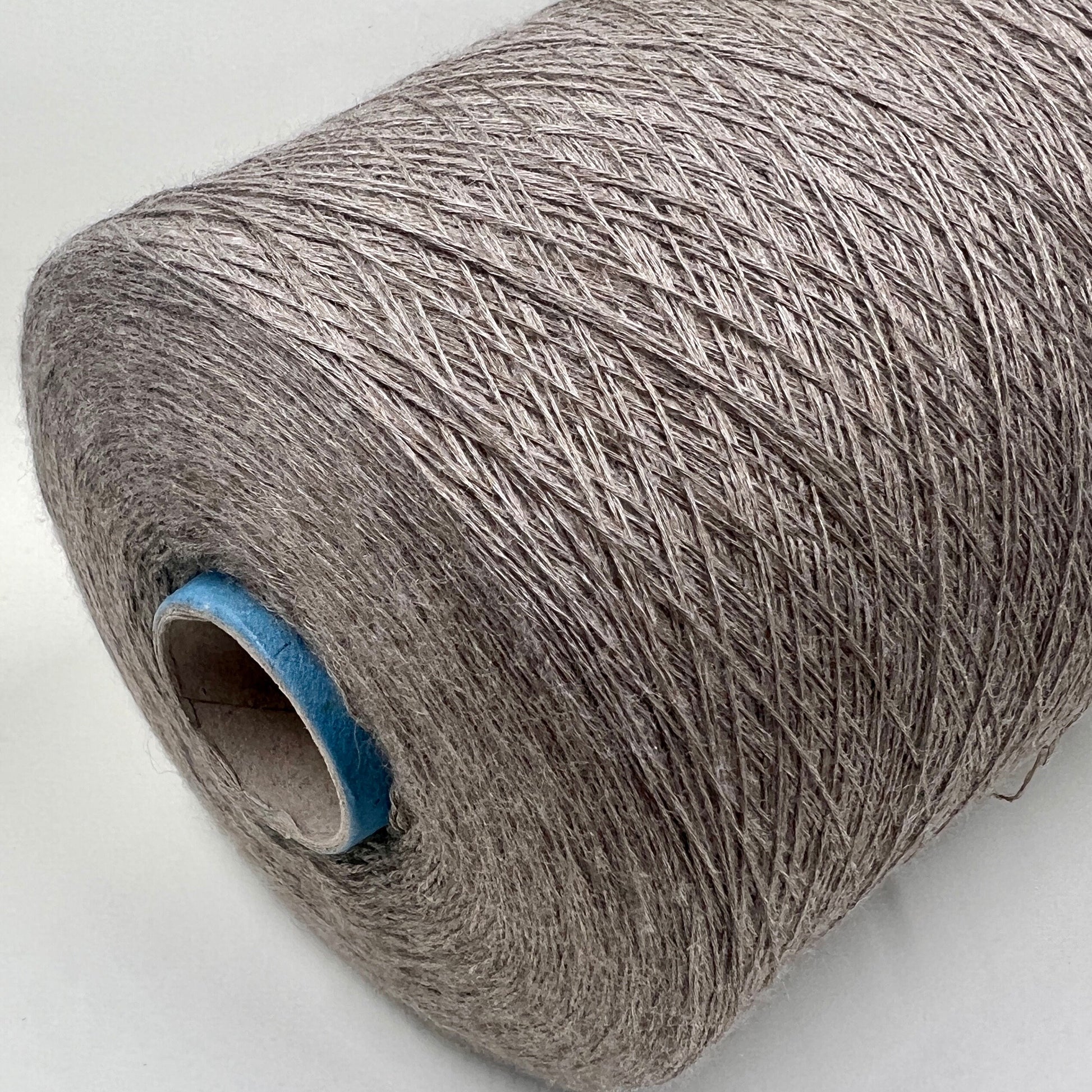 Royal Cashmere Yarn 70%, Silk Yarn 30%,Color Gray. Profilo SNC , Yarn on Cone. Italian Lace Yarn. Hand and Machine Knitting. Fiber: Royal Cashmere Yarn 70%, Silk Yarn 30%,Nm 1/80x5 Reference: Profilo SNC for Machine knitting and Hand Knitting.