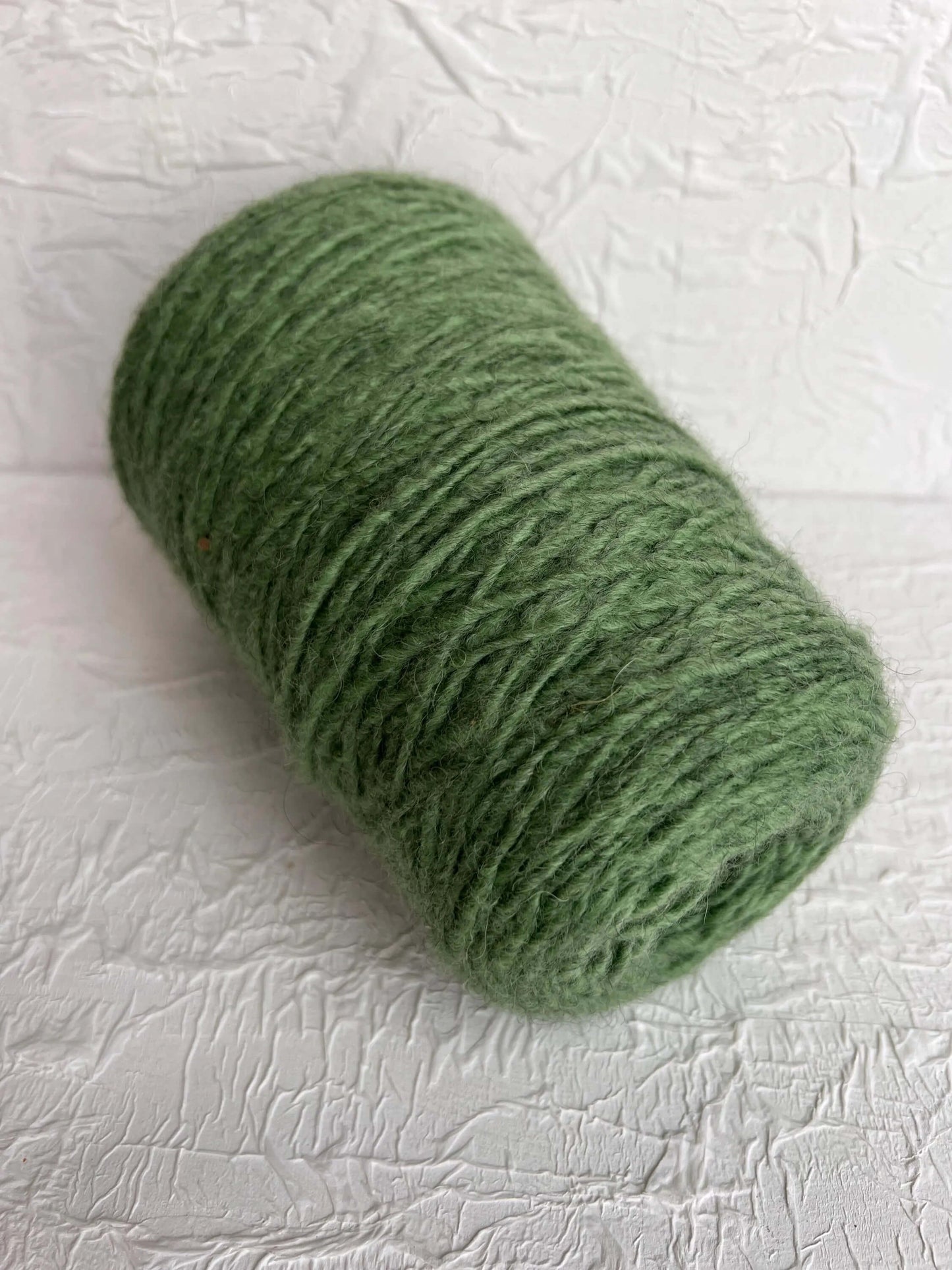 Bunny. Wool Yarn 50%, Baby Alpaca Yarn 25%, PA 25%. Color Green. Per 100 gr