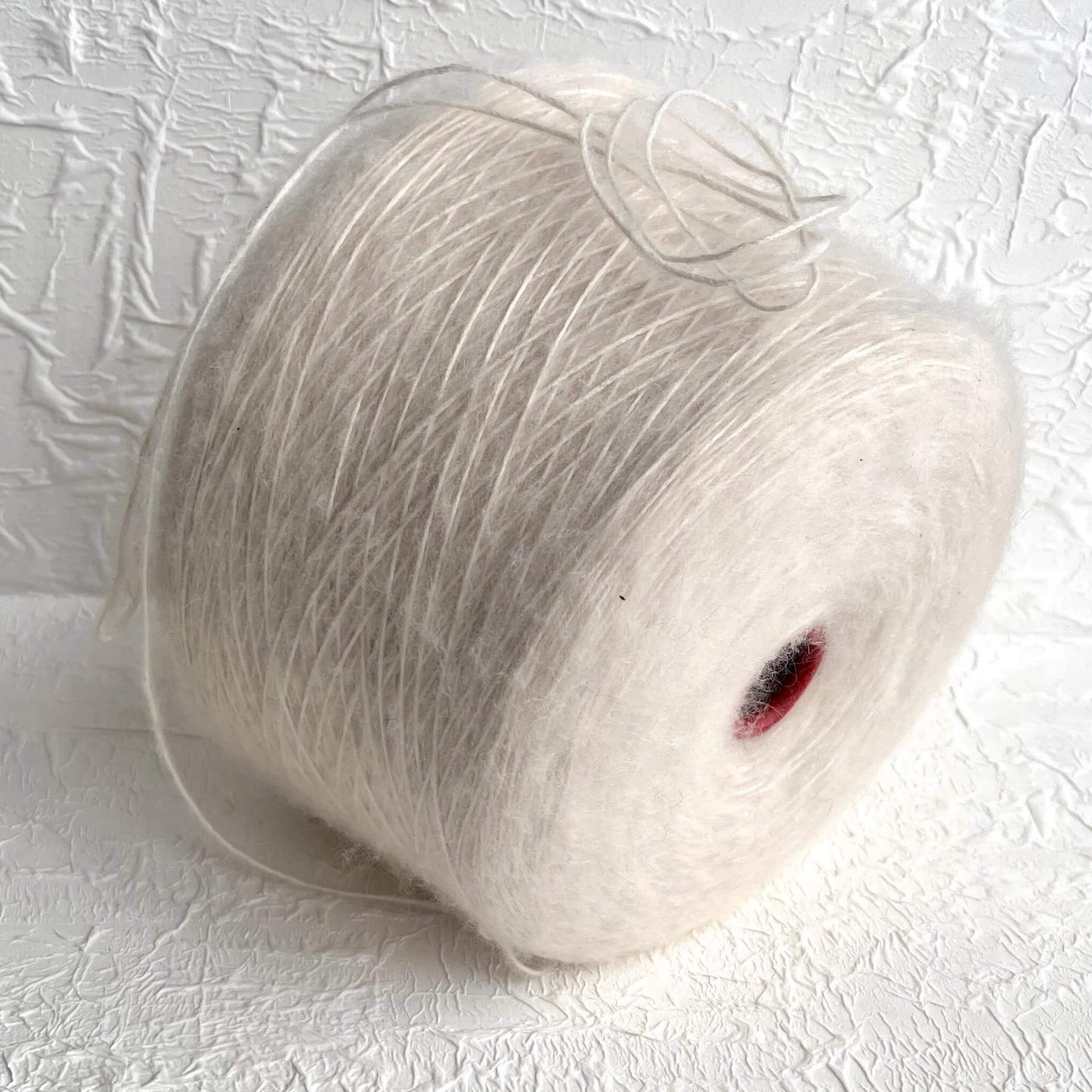 SOFFIO Kid Mohair yarn 35%, Silk yarn 50%, Merino yarn 15%. White. Per 100 gr