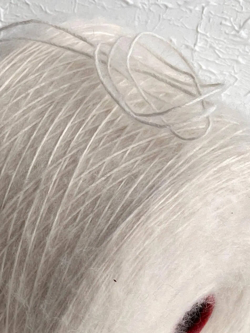 SOFFIO Kid Mohair yarn 35%, Silk yarn 50%, Merino yarn 15%. White. Per 100 gr
