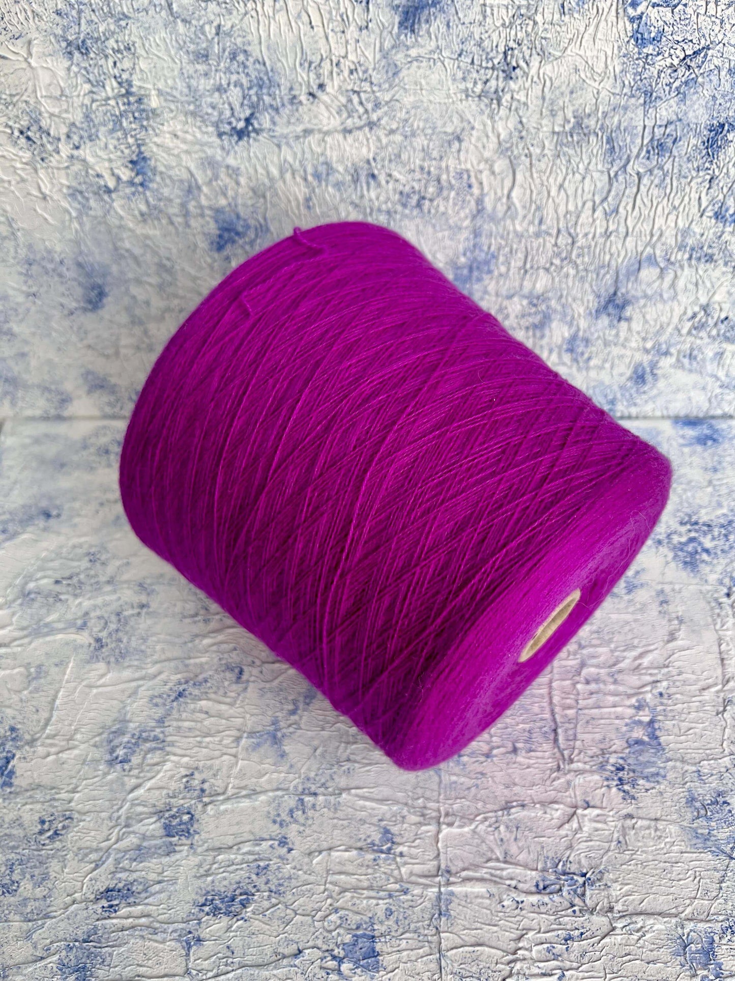 Cashmere lace yarn. Yarn on cone. Italian Yarn for Hand or Machine Knitting.
100% Cashmere Yarn. Loro Piana yarn
Fiber: 100% Cashmere yarn 2/27. Yardage: 1350m per 100g
Colour: Violetto. This is a very soft pure cashmere yarn on cone.The yarn will be perfect for weaving and knitting but can also be used for crocheting.