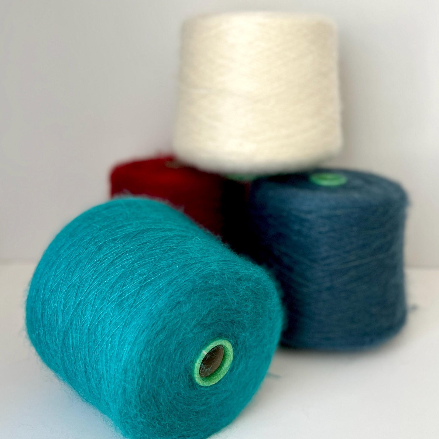 Super Kid Mohair 70 & Silk 30 % yarn on Cone. White. Per 100 gr