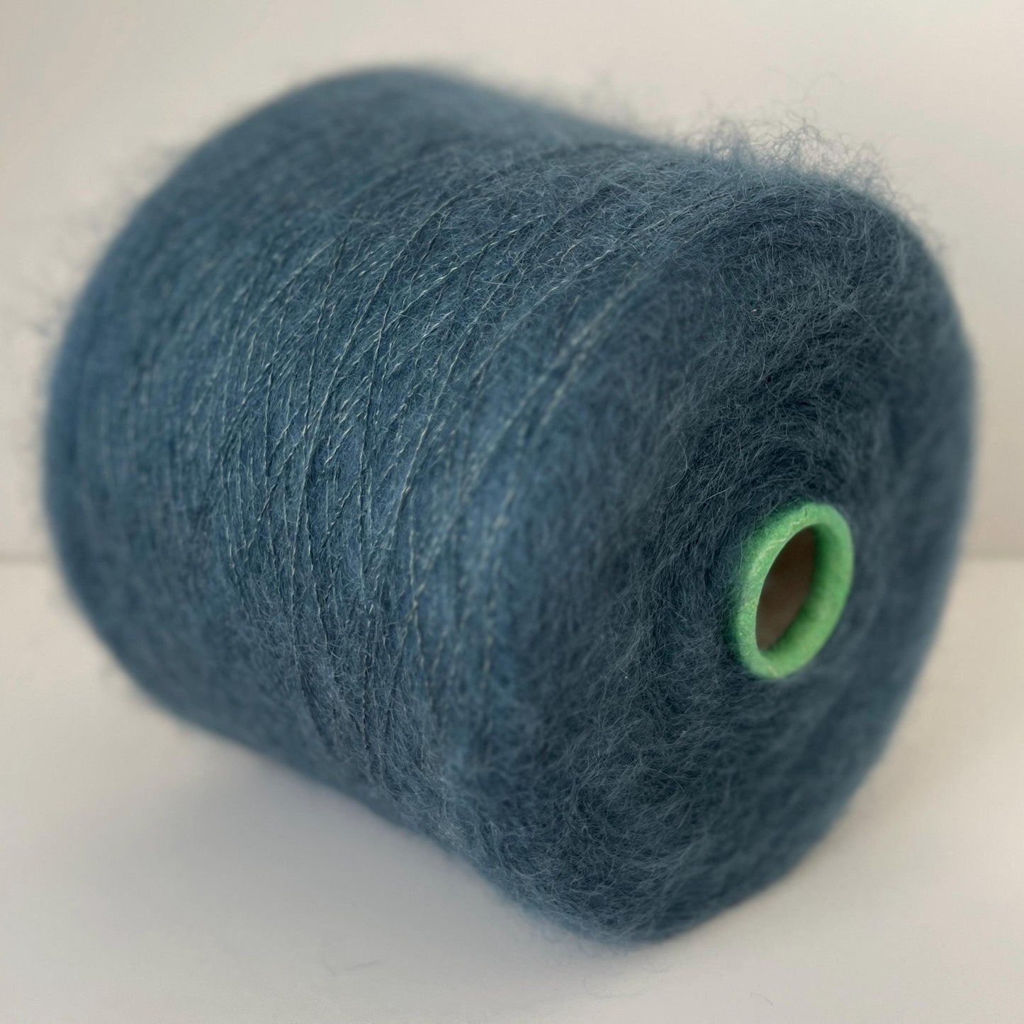 Super Kid Mohair 70 & Silk 30 % yarn on Cone. Stainless steel. Per 100 gr