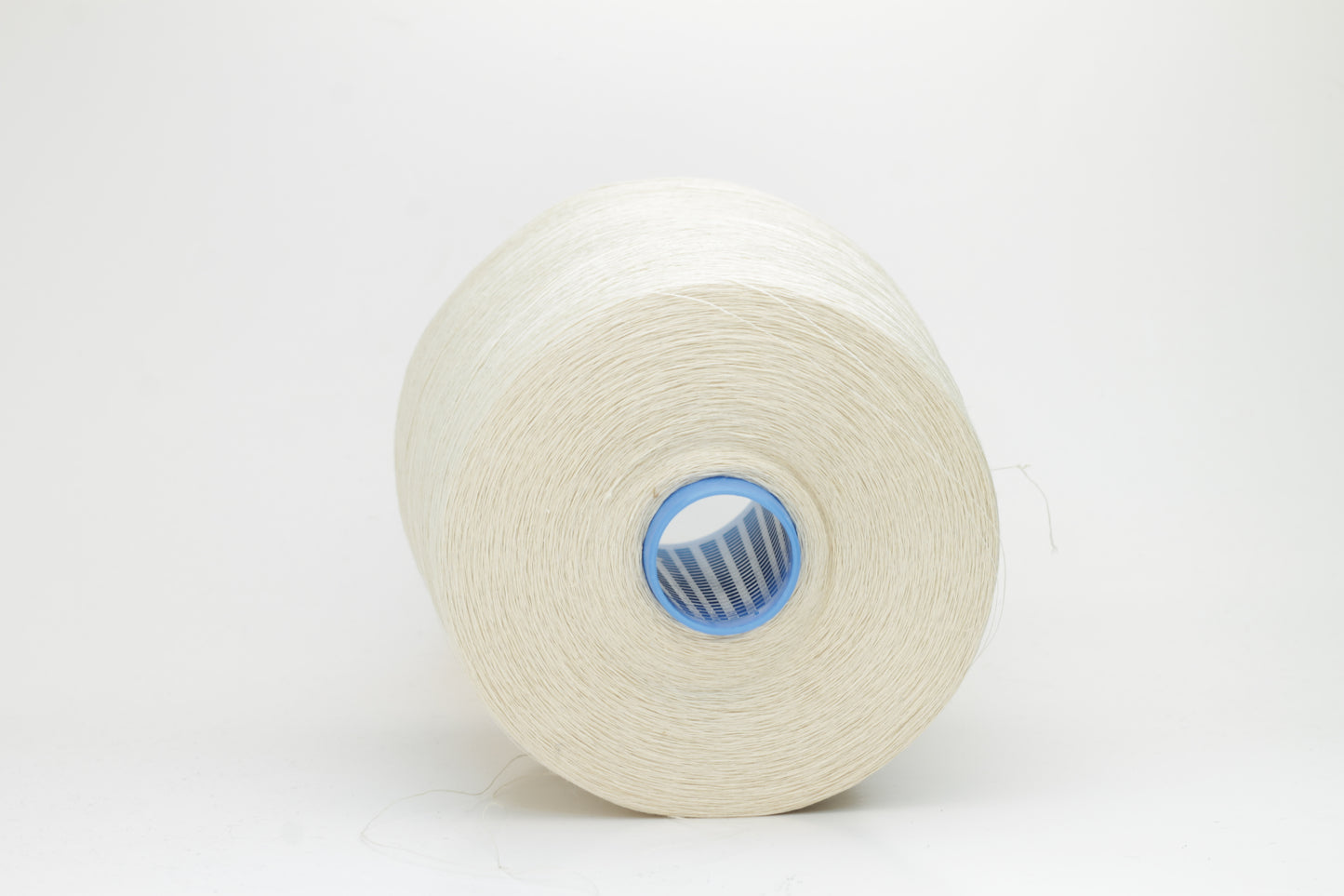 Fine, single-ply linen yarn in a rich Cera. Reveals a crisp texture and subtle natural sheen, typical of pure linen fiber.