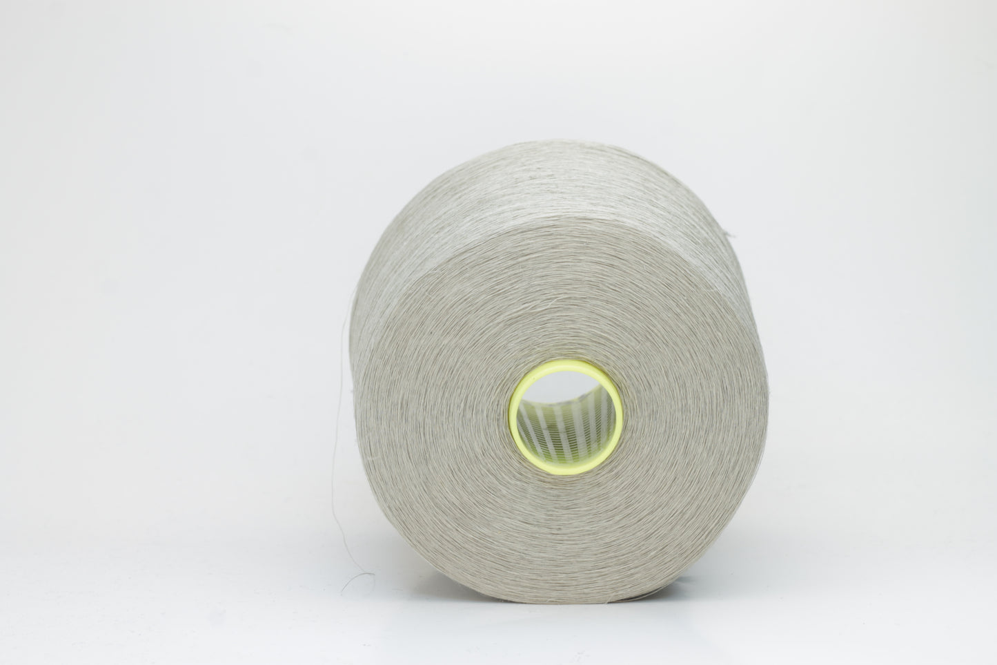 Fine, single-ply linen yarn in a rich Naturale. Reveals a crisp texture and subtle natural sheen, typical of pure linen fiber.