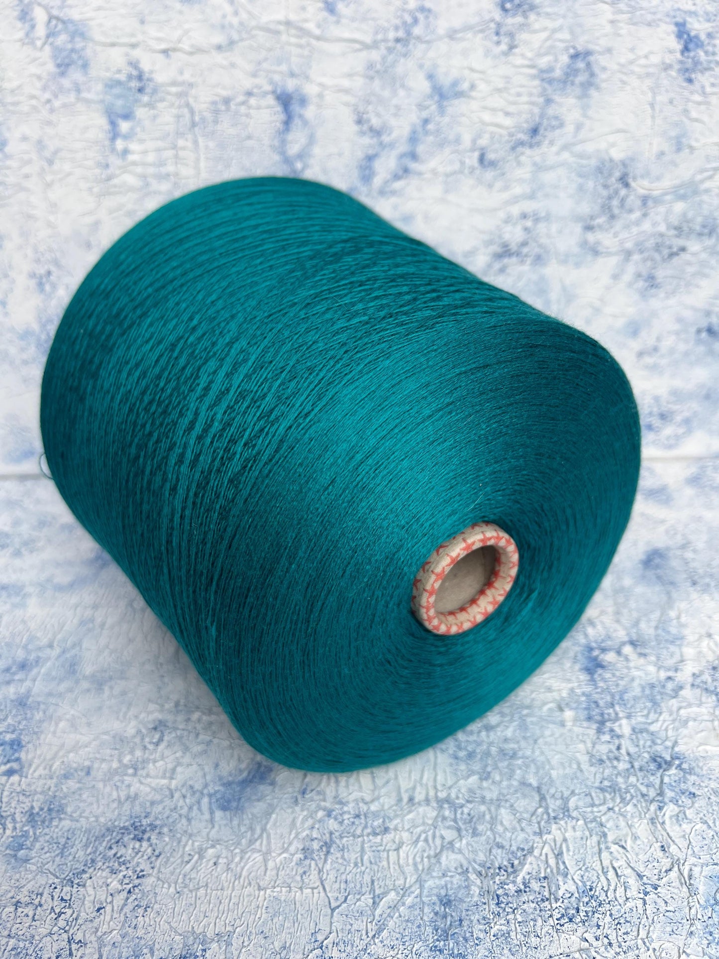 100% Merino yarn, Yarn on cone, Color DarkCyan. Per 100 gr