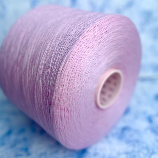 100% Merino yarn on cone, Color Pink. Per 100 gr