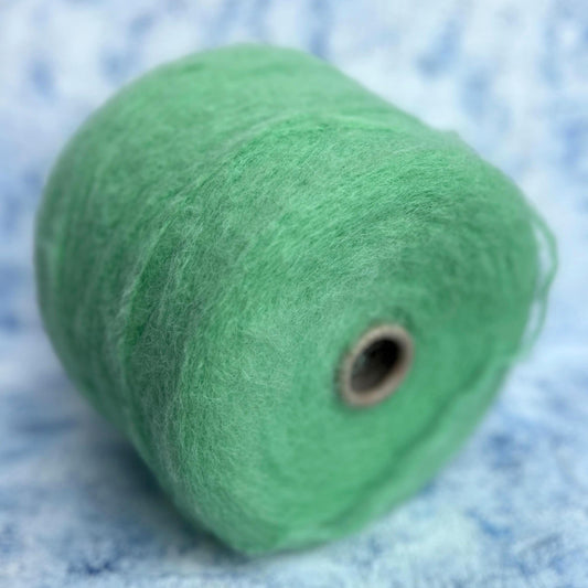 Baby Alpaca yarn 87%, PA 11%, Elastan 2%. Light Green.Per 100 gr