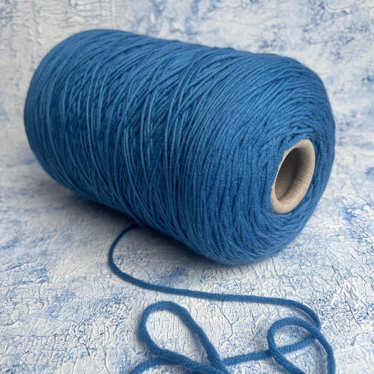 100% Merino wool yarn, IGEA Aquila yarn on cone, Color Blue. Per 100 gr
