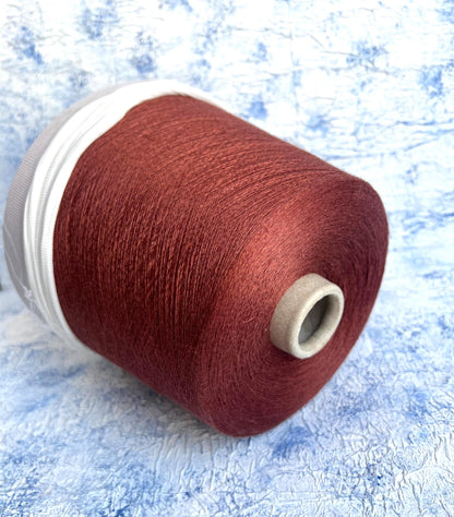 Linen yarn 83% & Silk yarn 17%.Yarn opn cone for knitting. Rust.Per 100 gr