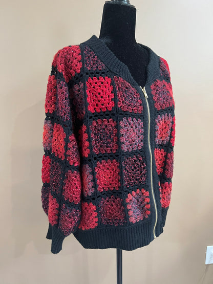 Granny Square Cardigan is crafted from premium quality yarn.