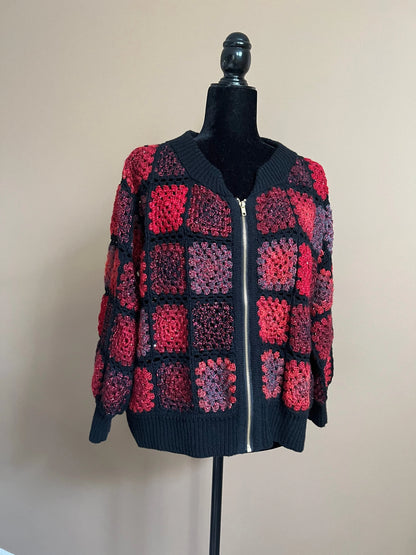 Granny Square Cardigan is crafted from premium quality yarn.