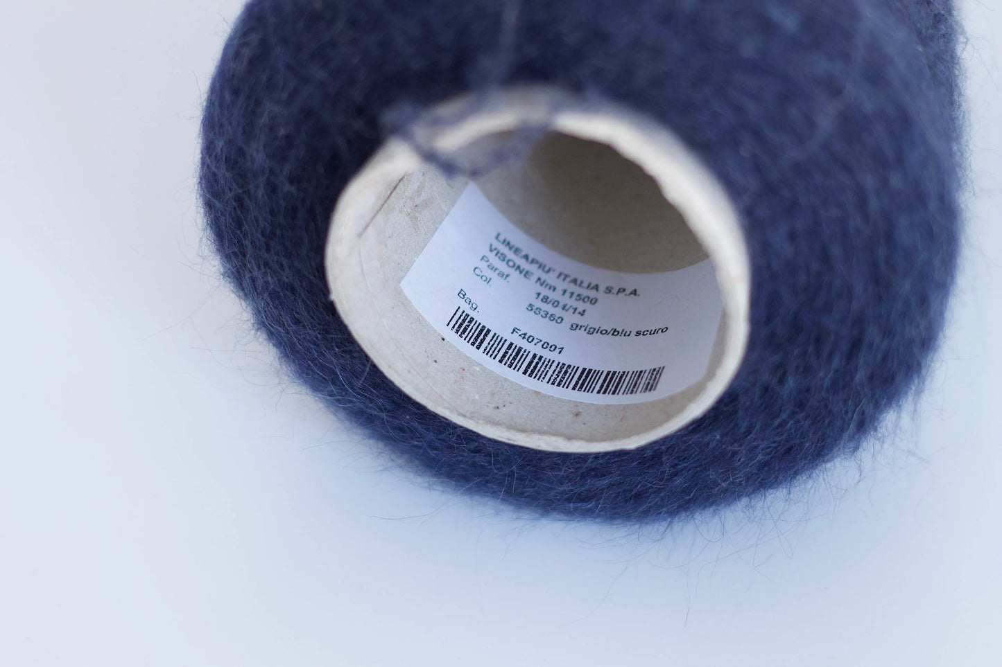 Fibre: 38% kid mohair yarn, 38% merino yarn, 19% polyamide yarn, 5% elastane yarn. Country: Italy. Color: navy. This is a luxurious, very soft and fluffy yarn with a wonderful composition available at our Yarn Store in Canada. Can be used for knitting (both machine and hand).