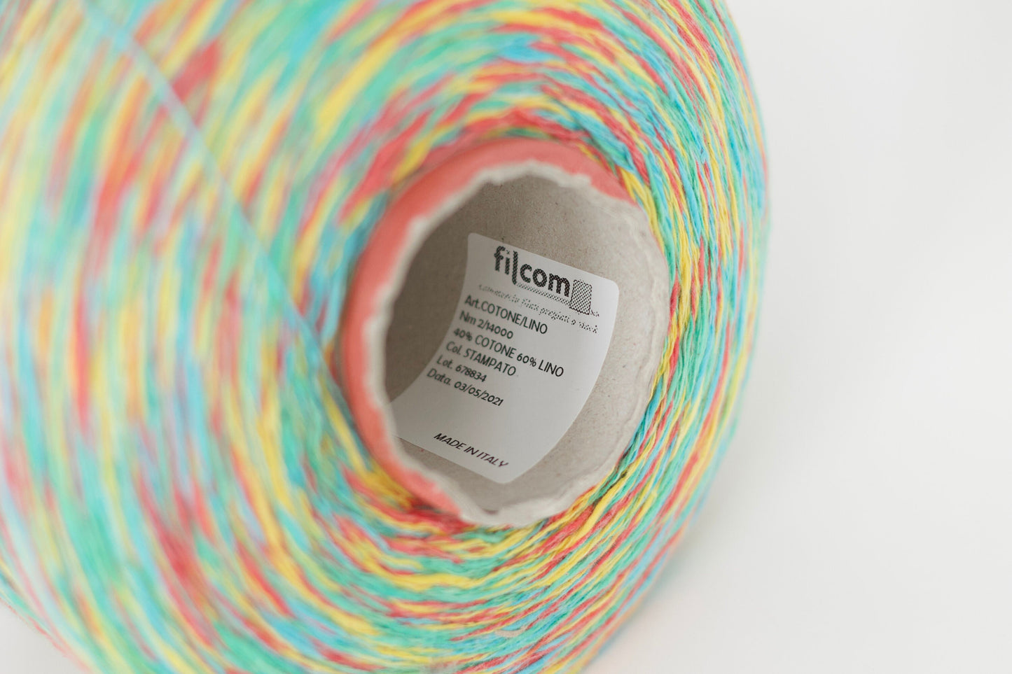 Reference: FILCOM COTTENE LINO yarn. Fiber Composition: 40% Cotton yarn, 60% Linen Yarn. Yarn Color: STAMPATO multicolor. Versatile Creativity: Whether you're an enthusiast of hand knitting or machine crafting. You can buy this beautiful yarn at our yarn store in Canada.